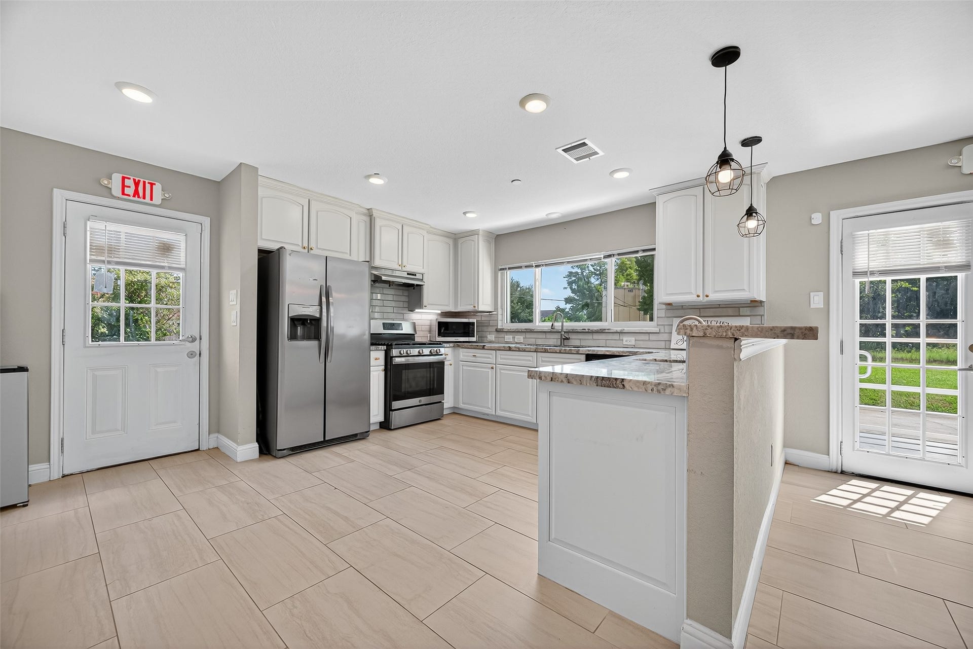 29902 E Hawthorne Drive, Spring, TX 77386 29902-Kitchen with side door to driveway area.