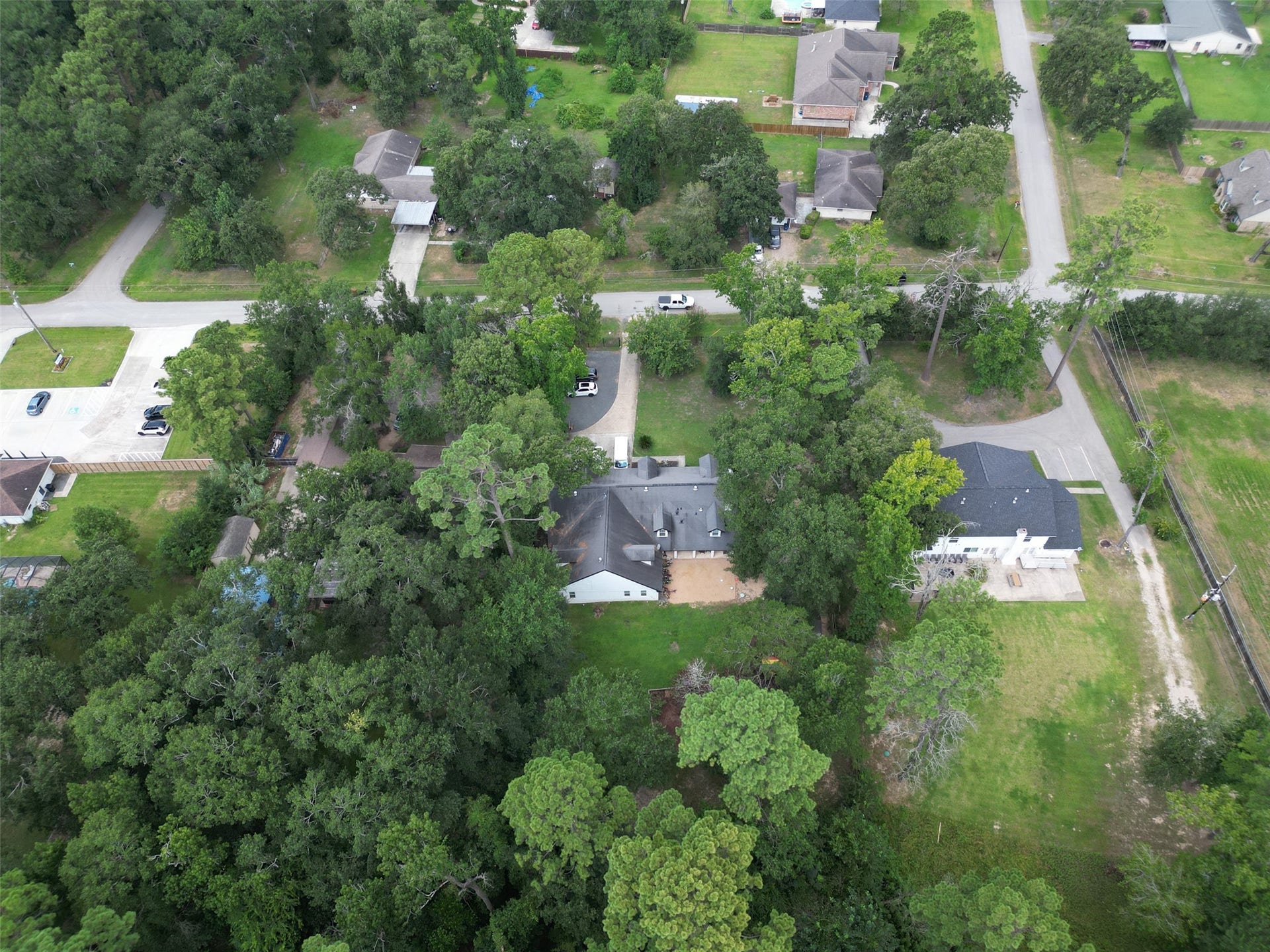 29902 E Hawthorne Drive, Spring, TX 77386 29902 and 29818 view to rear of both properties. 29818 is on the left and has a fully fenced in back yard.