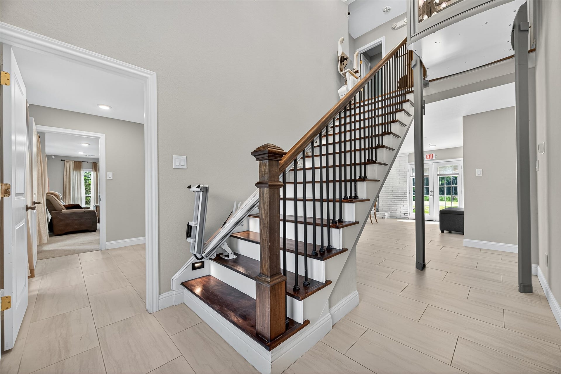 29902 E Hawthorne Drive, Spring, TX 77386 29902- Entry showing planned office to the left into TV room. Stairs, chair lift, and elevator provide access to second floor w/4 bedroom 2 baths. Just past stairs is dining area, kitchen, and a hall to right with two bedrooms.