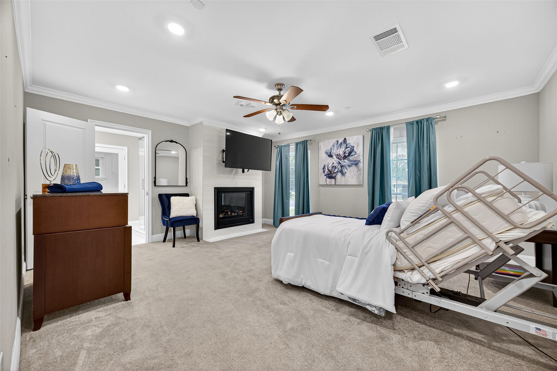 29902 E Hawthorne Drive, Spring, TX 77386 29902-opposite view of large bedroom first floor with fireplace and large bathroom.