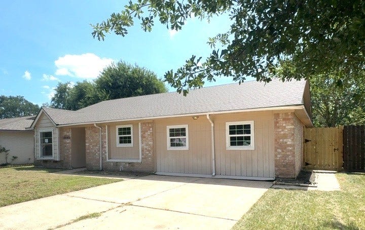 Property photo for 7735 Whispering Wood Lane, Houston, TX