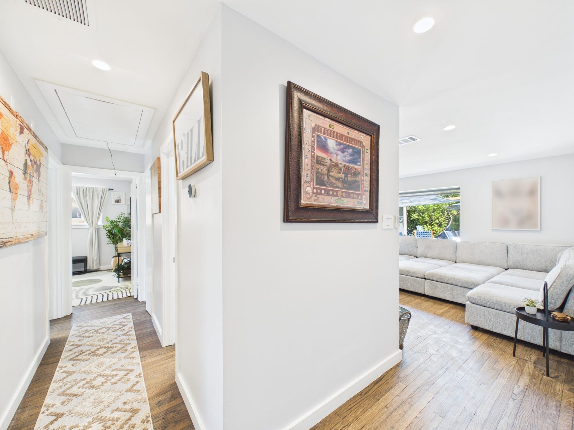 Two Bedrooms, Common Bath and Utility Closet Down the Hall