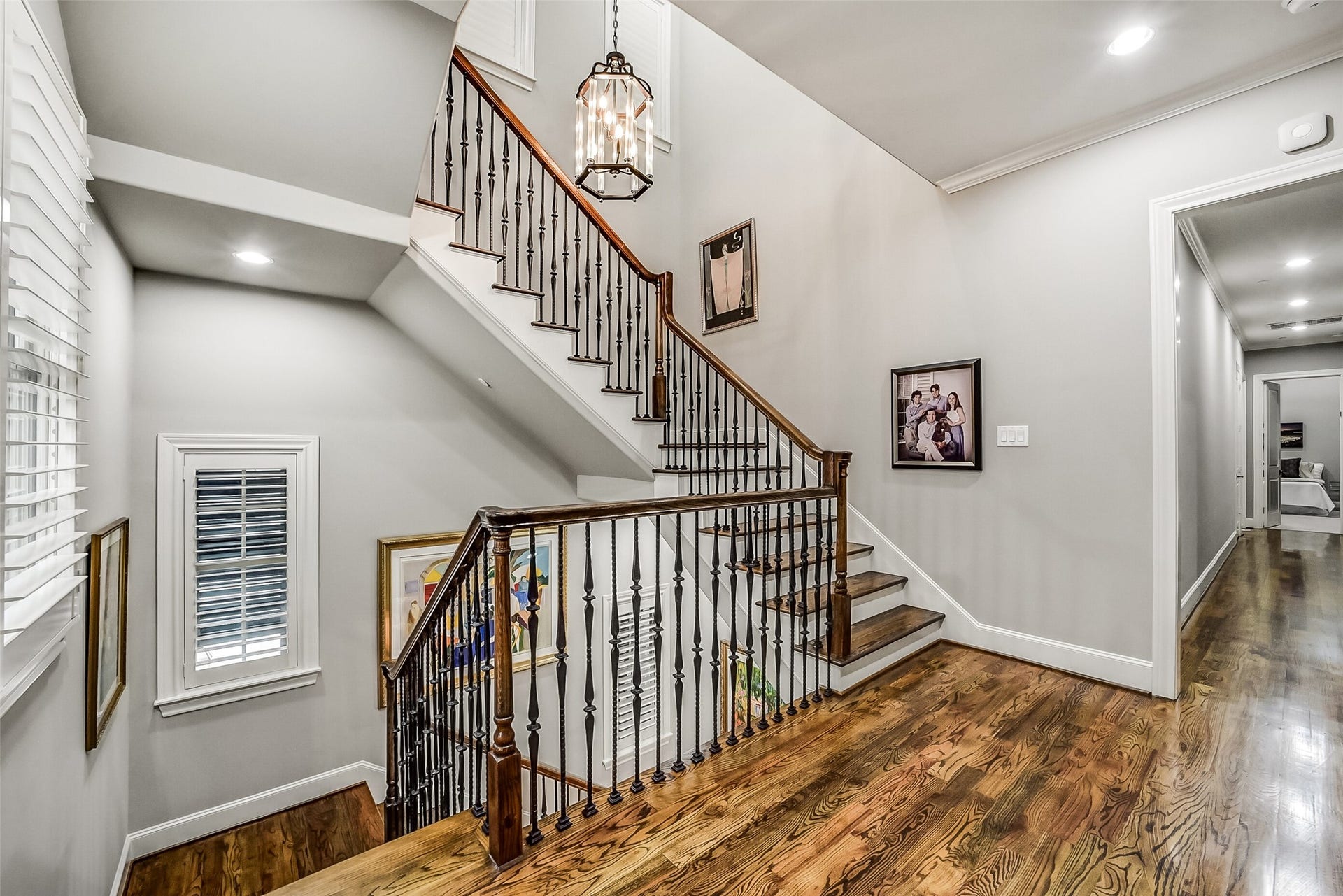 11 Southside Circle, Southside Place, TX 77025 Second-floor landing with striking staircase providing seamless access up to the third floor and down to the main living level. On this floor is primary suite and two additional bedrooms.