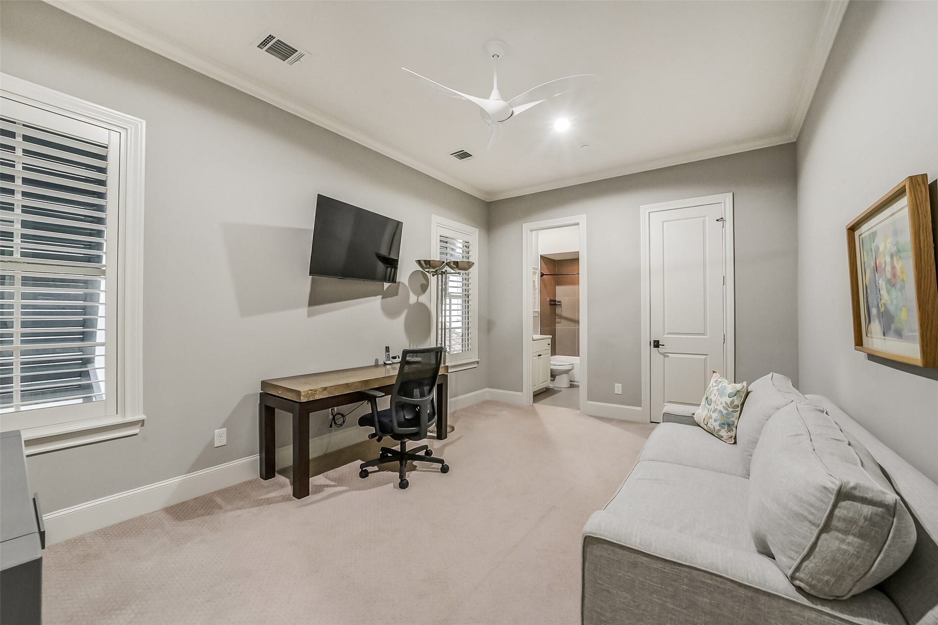 11 Southside Circle, Southside Place, TX 77025 This spacious secondary bedroom is currently utilized as a flex space, showcasing the rooms versatility.