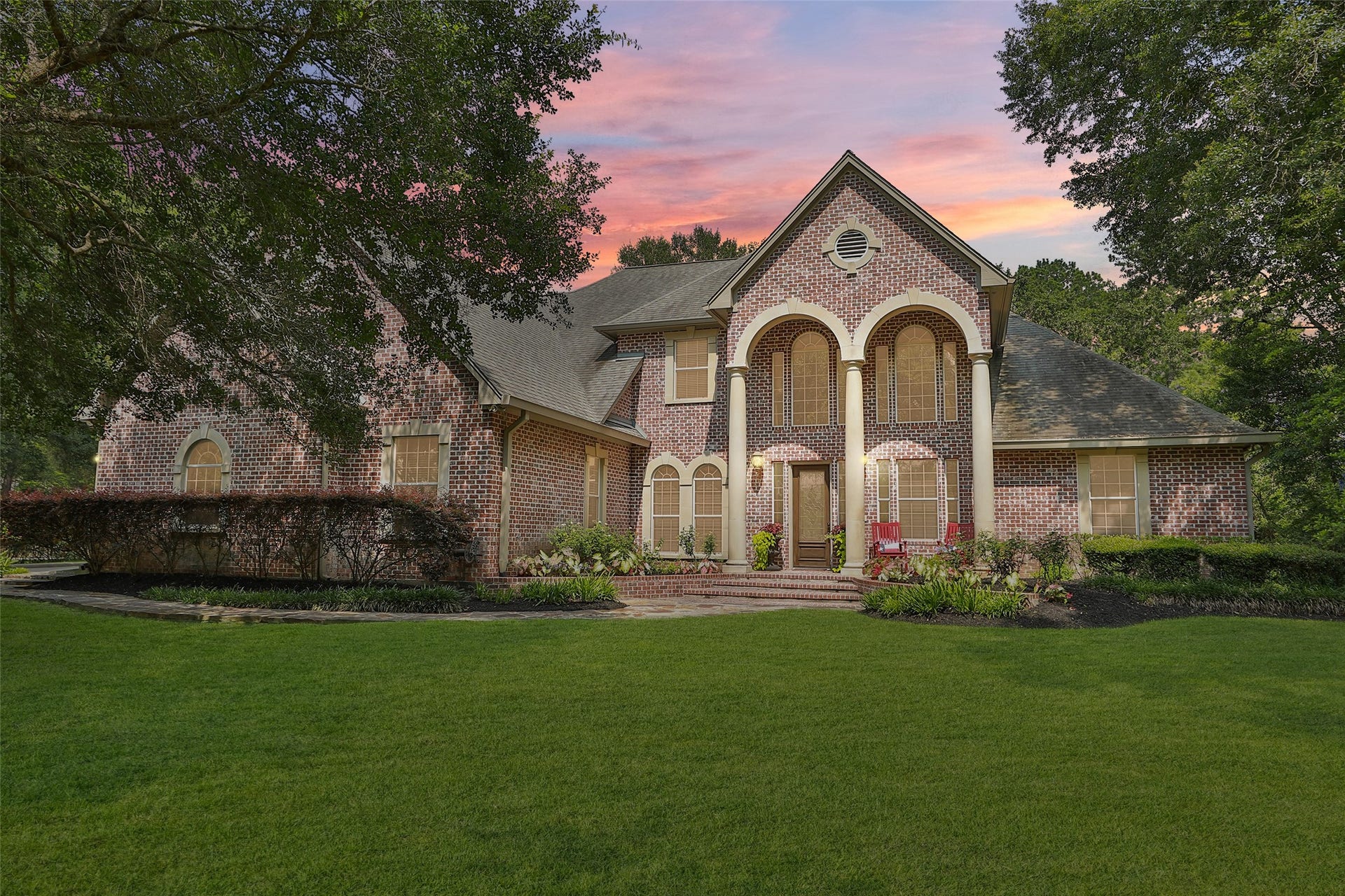 This stunning two story brick home features a grand entrance with tall columns and arched windows. Which combines luxury, functionality and natural beauty. Outside of the city limits, but only 10 minutes to downtown.