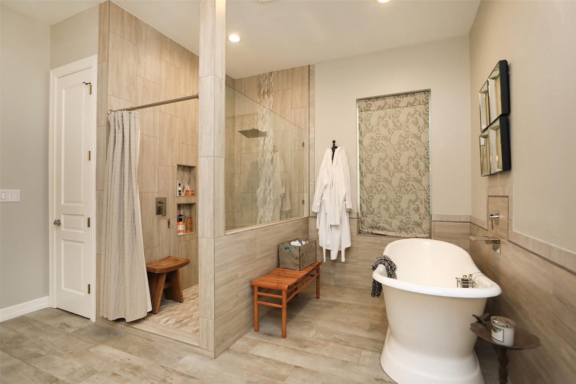 Primary bathroom with large shower and soaking tub.