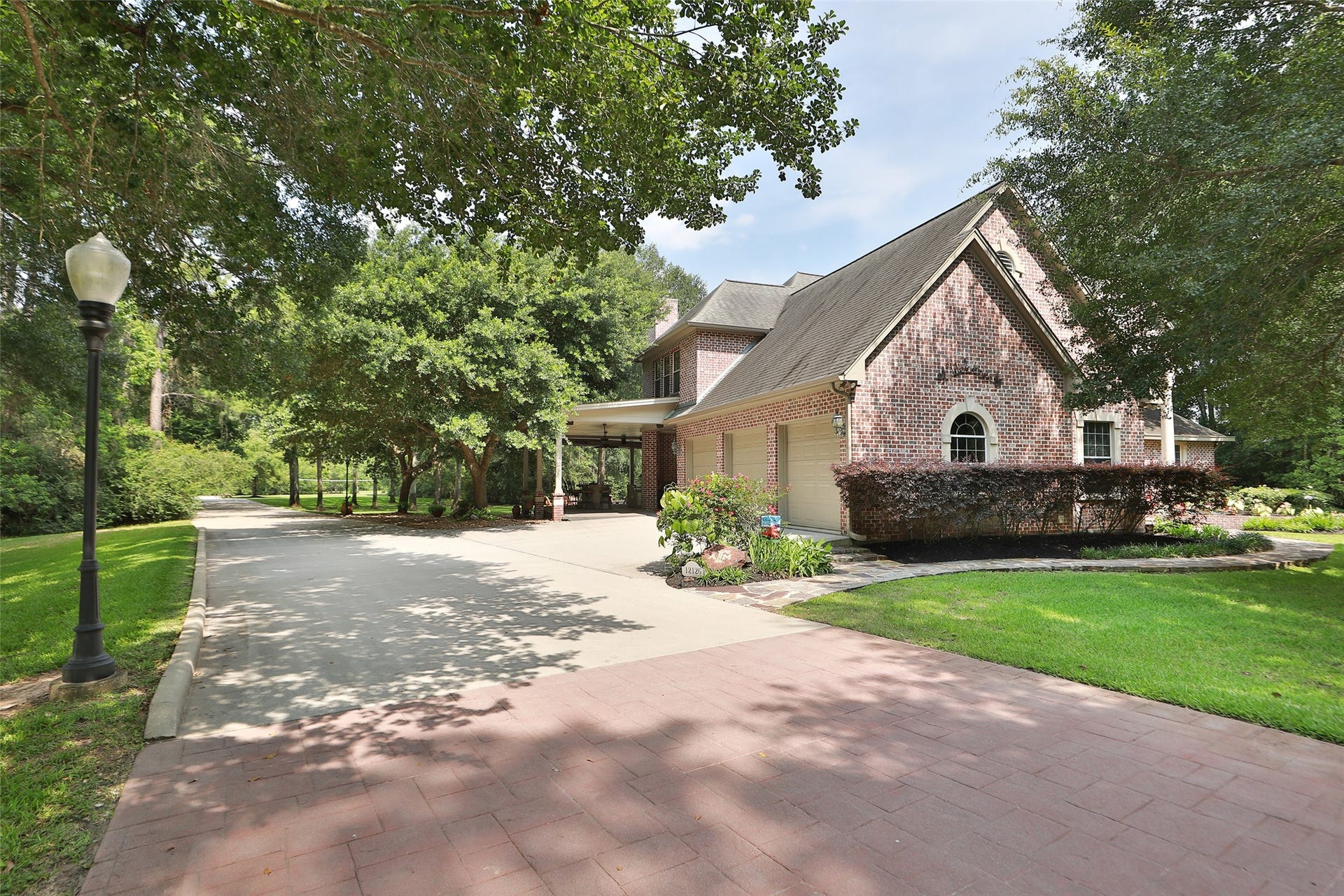 All brick custom home with a 2.5 garage and a bonus room above the garage.