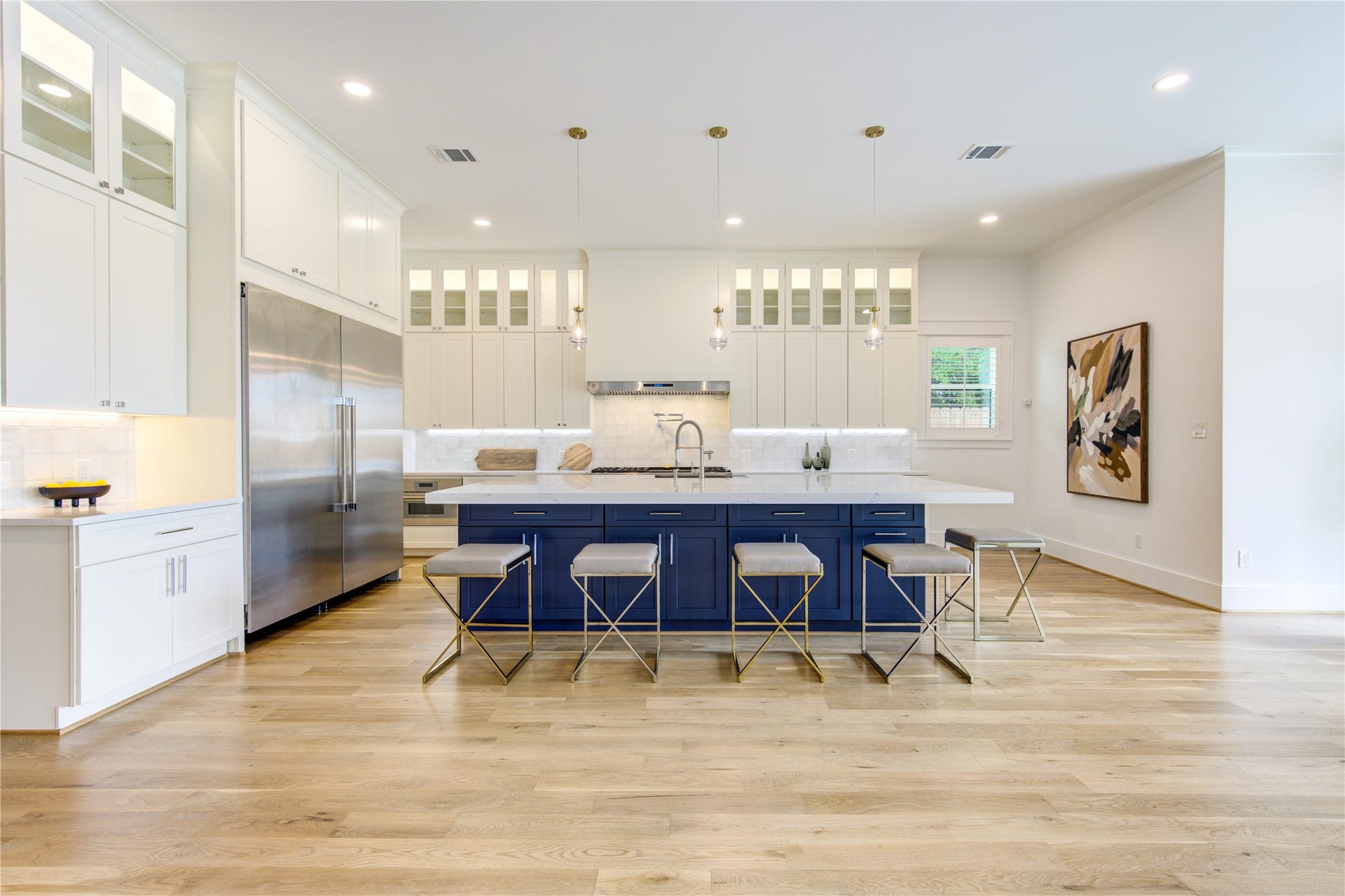 This is the ultimate Chef's dream kitchen with high-end appliances, Massive 11x6 3cm Quartz Island on Custom Cabinets.