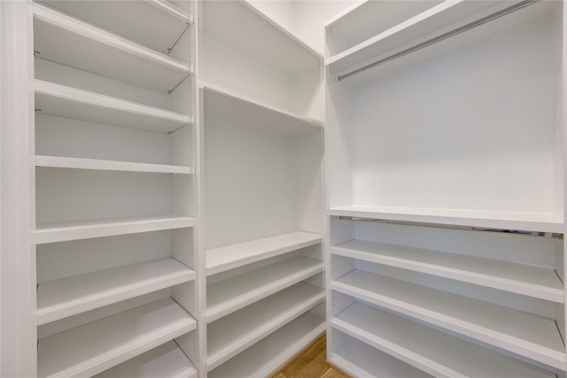 All the lower boxes can be used for hanger spaces of floating shelves. Shoe Fitting bench installed.