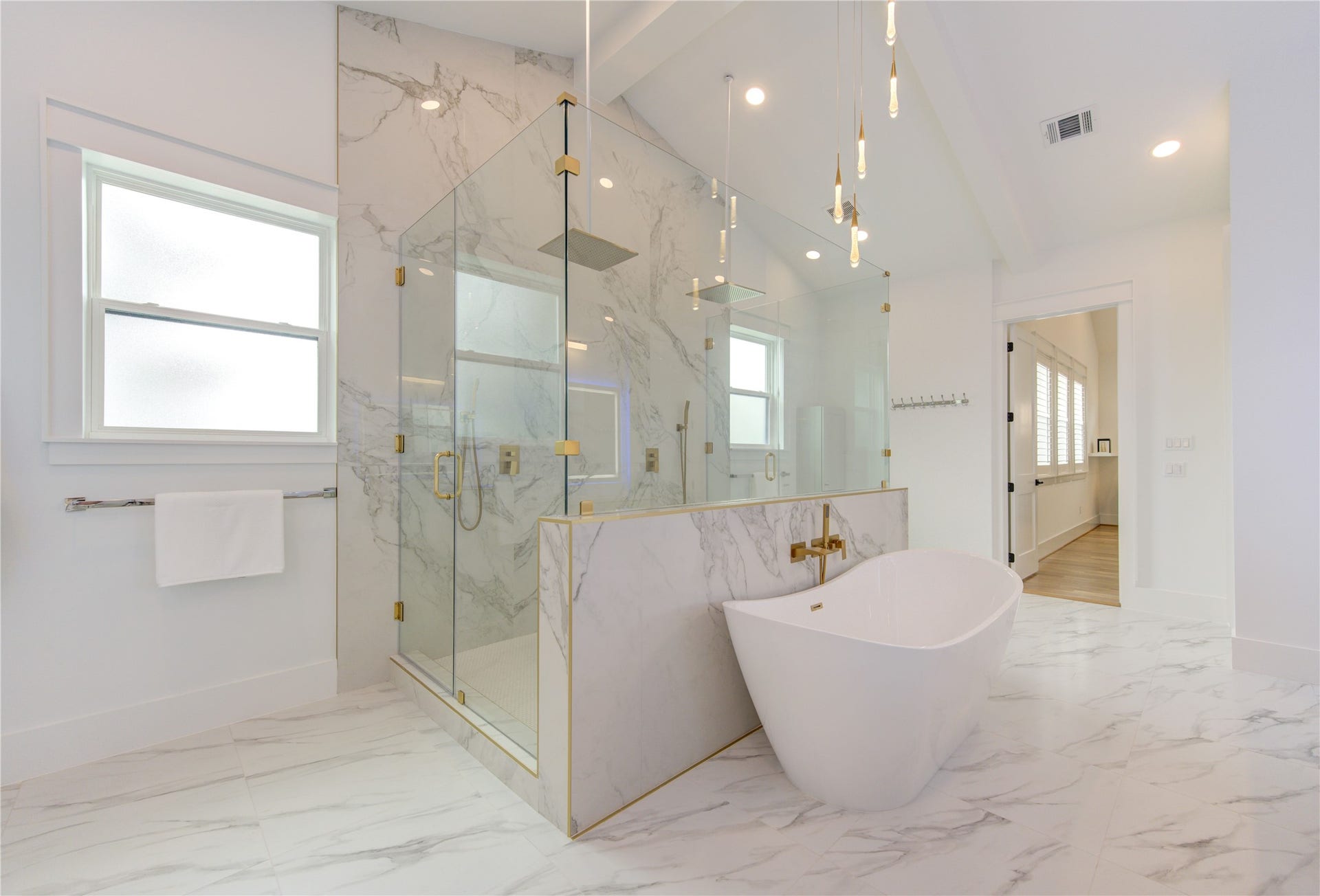 So spacious and well designed with Large Format Porcelain tiles to make Shower experience a romantic one each time.