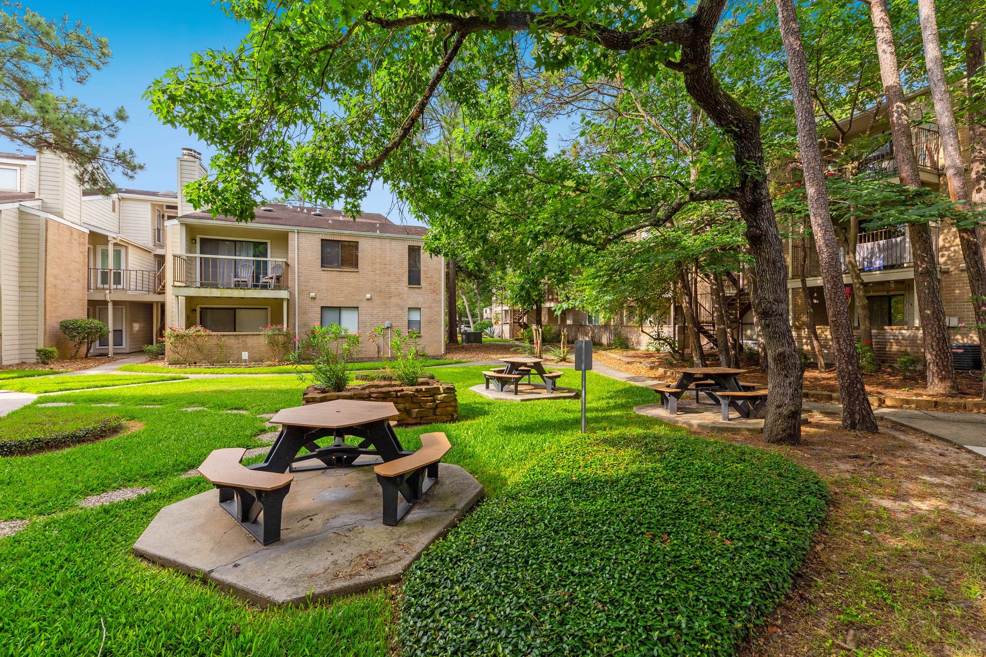 3500 Tangle Brush Drive, #132, The Woodlands, TX 77381 The back patio offers a beautiful view of the common green areas.