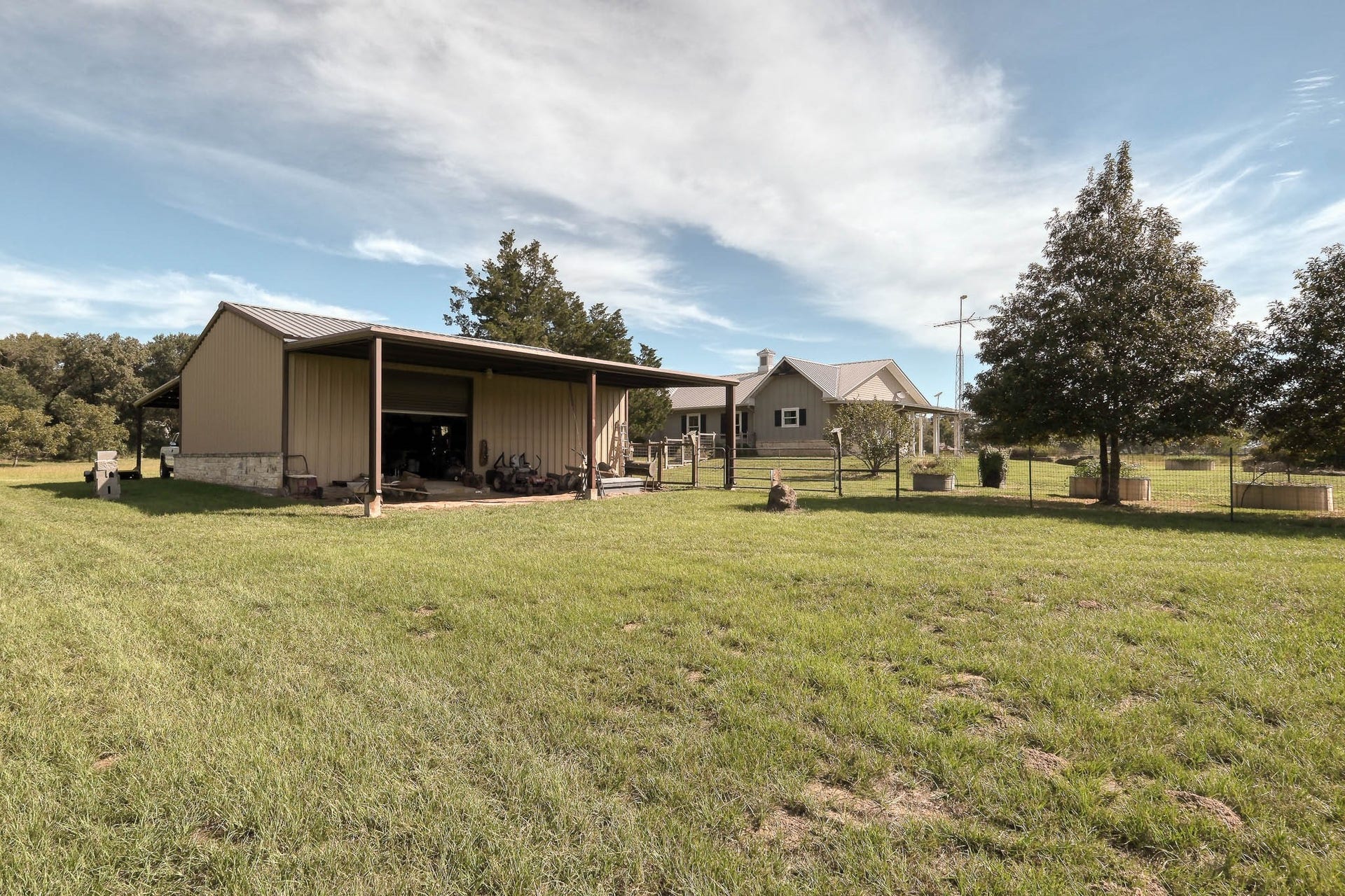 Shop with 4 car carport