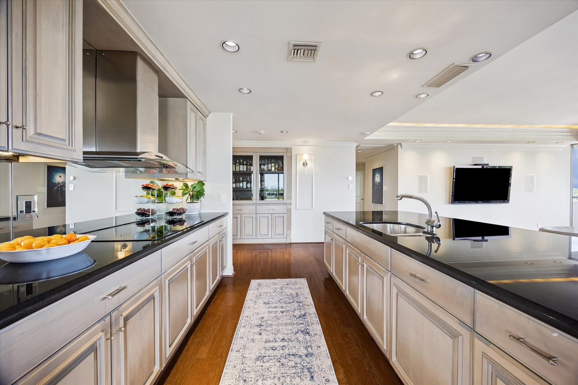 49 Briar Hollow Lane, #702, Houston, TX 77027 Galley view of the kitchen towards the entry.