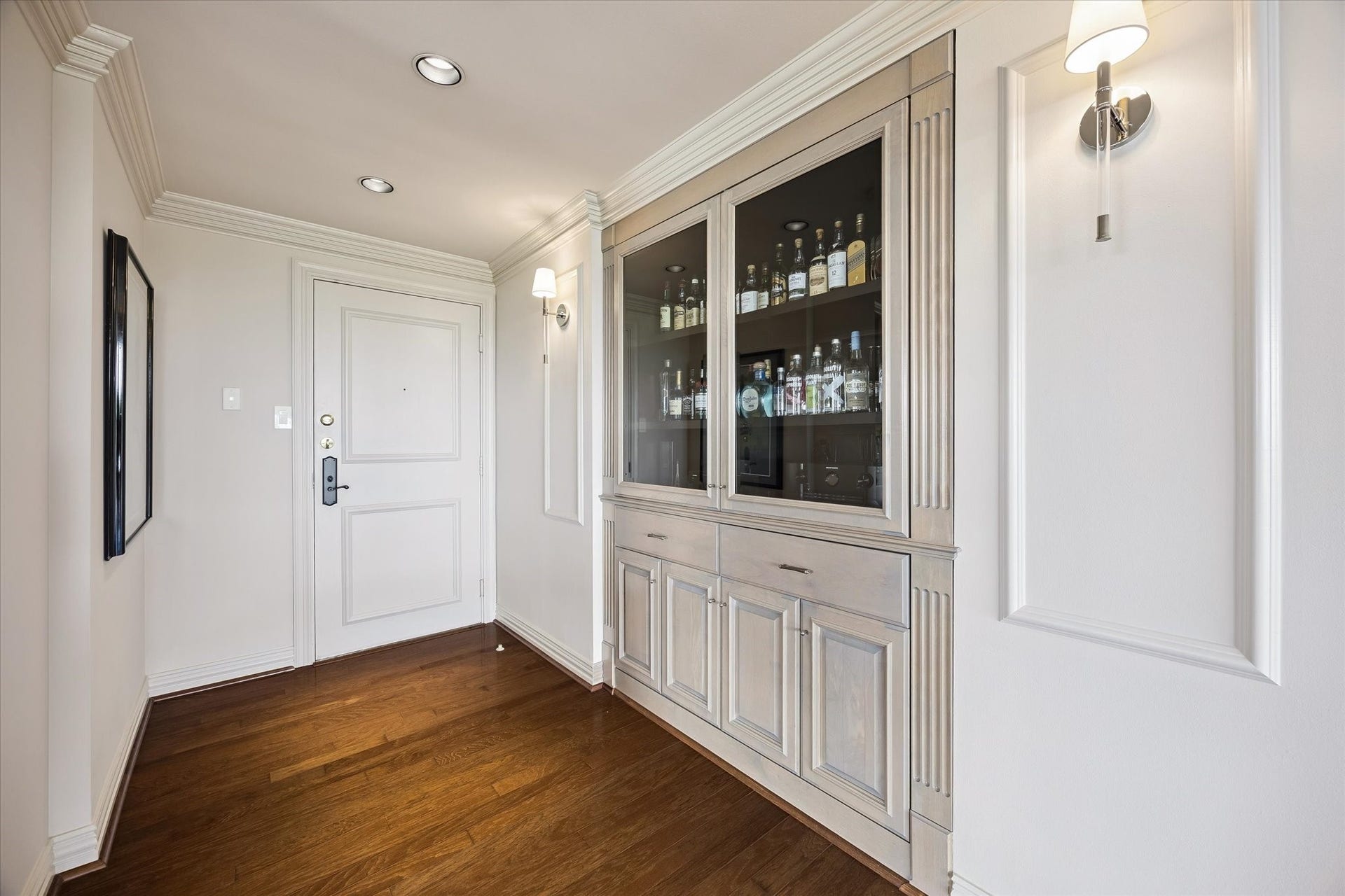 49 Briar Hollow Lane, #702, Houston, TX 77027 Custom built-in bar or display storage.