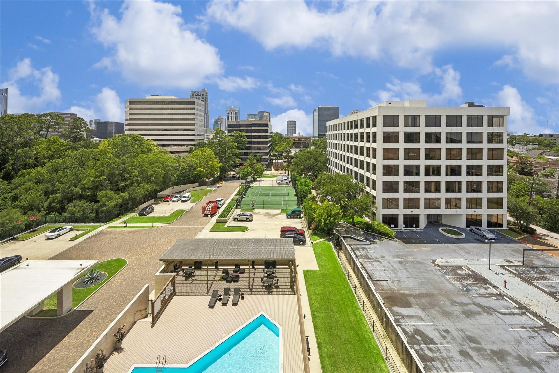 49 Briar Hollow Lane, #702, Houston, TX 77027 Views to the pool and grounds from the Primary Suite.