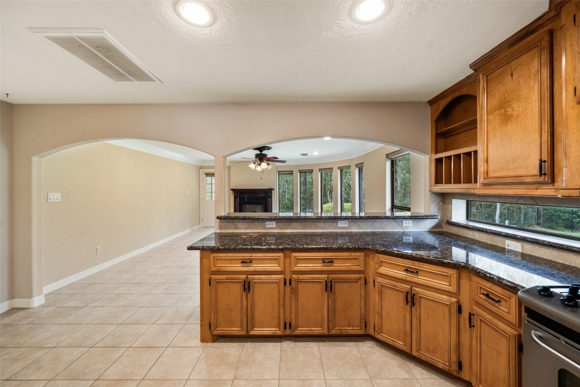 901 Longmire Road, #28, Conroe, TX 77304 Kitchen opens into a bright living area, The open floor plan enhances natural light and flow.