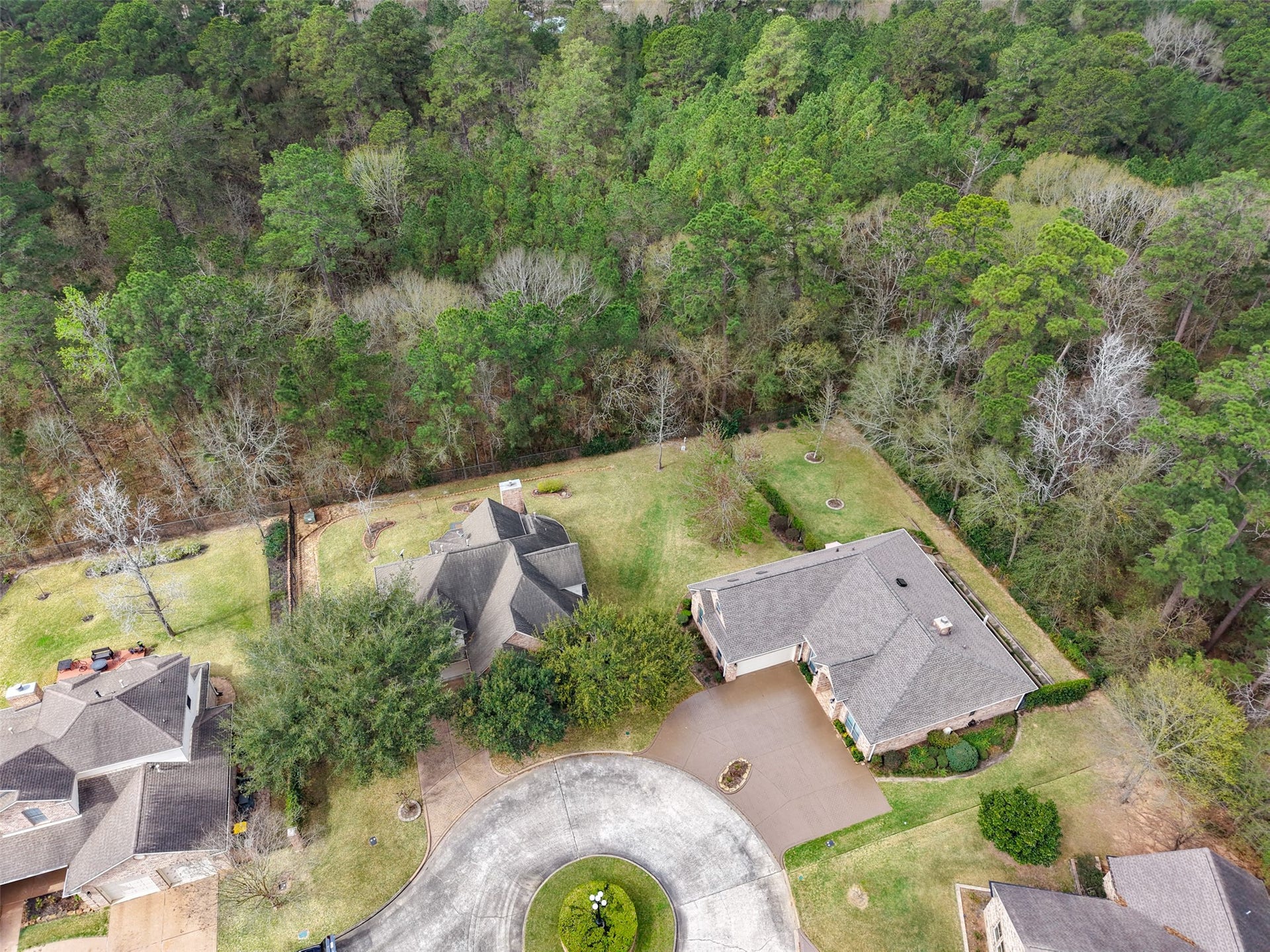 901 Longmire Road, #28, Conroe, TX 77304 Home located on a quiet cul-de-sac backing to nature reserve offering privacy and a serene natural setting.