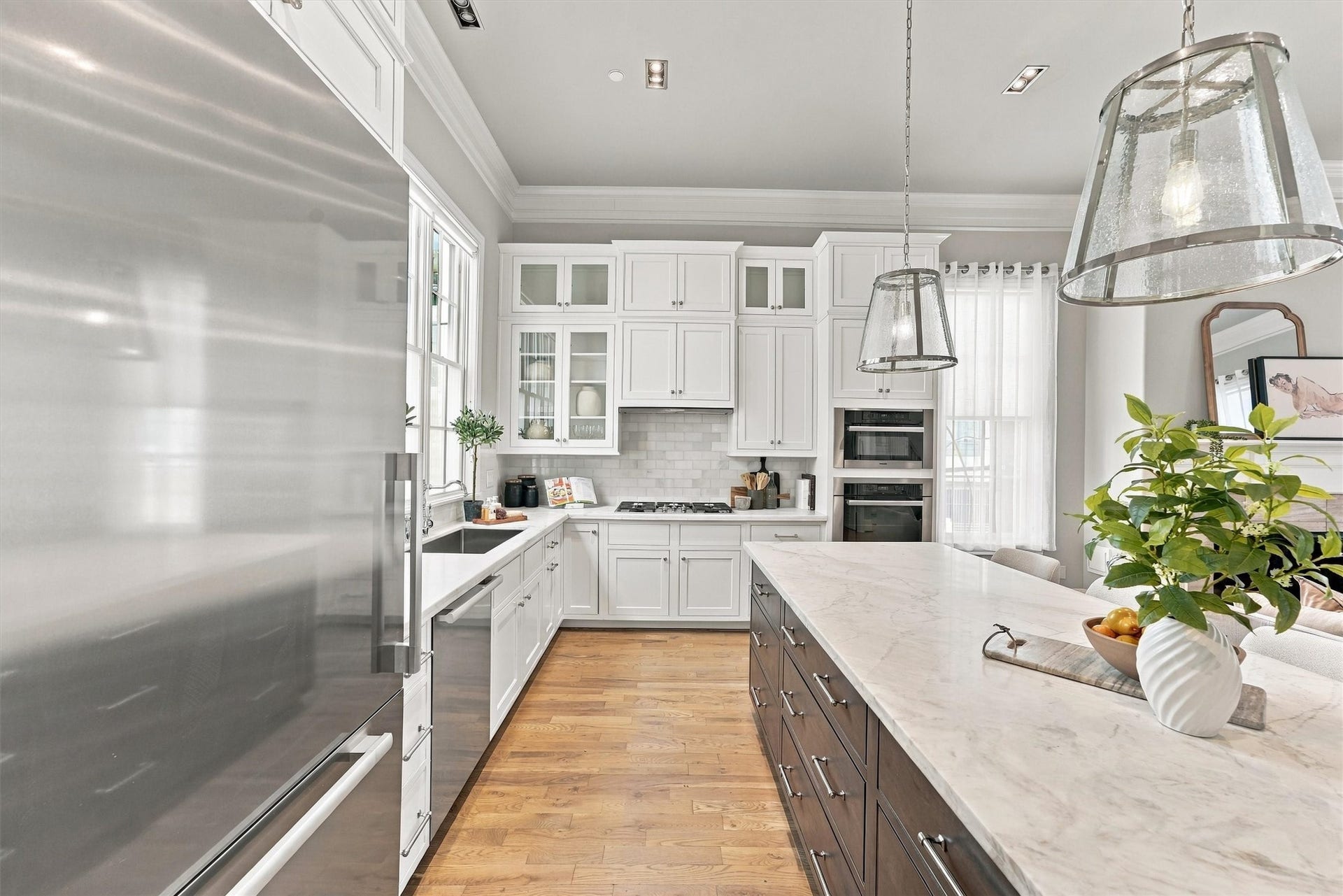 1306 Castle Court, Houston, TX 77006 Kitchen with a gas cooktop, subway-tile backsplash and Miele speed and convection ovens