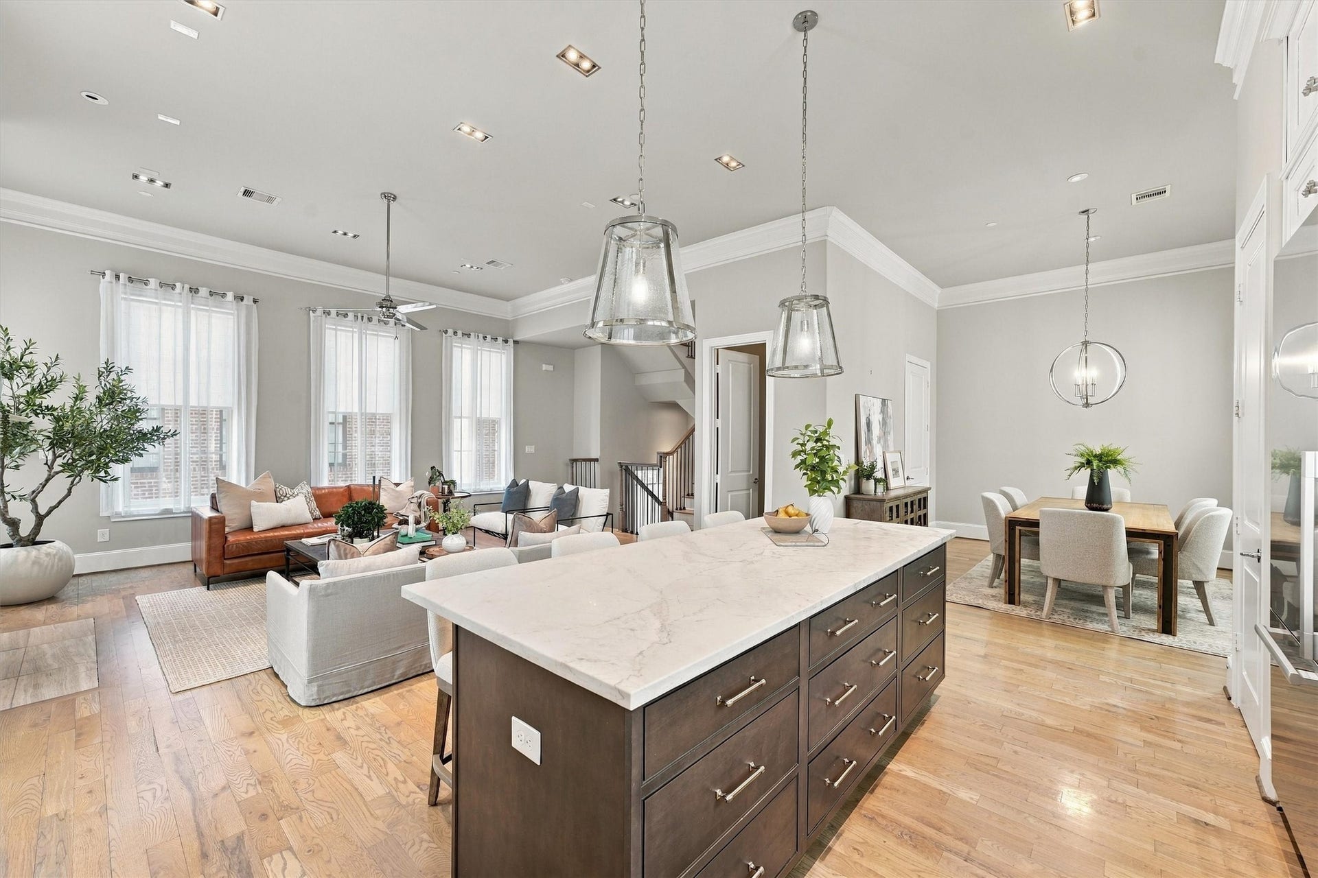 1306 Castle Court, Houston, TX 77006 Espresso-stained island with sight lines to the great room and dining area