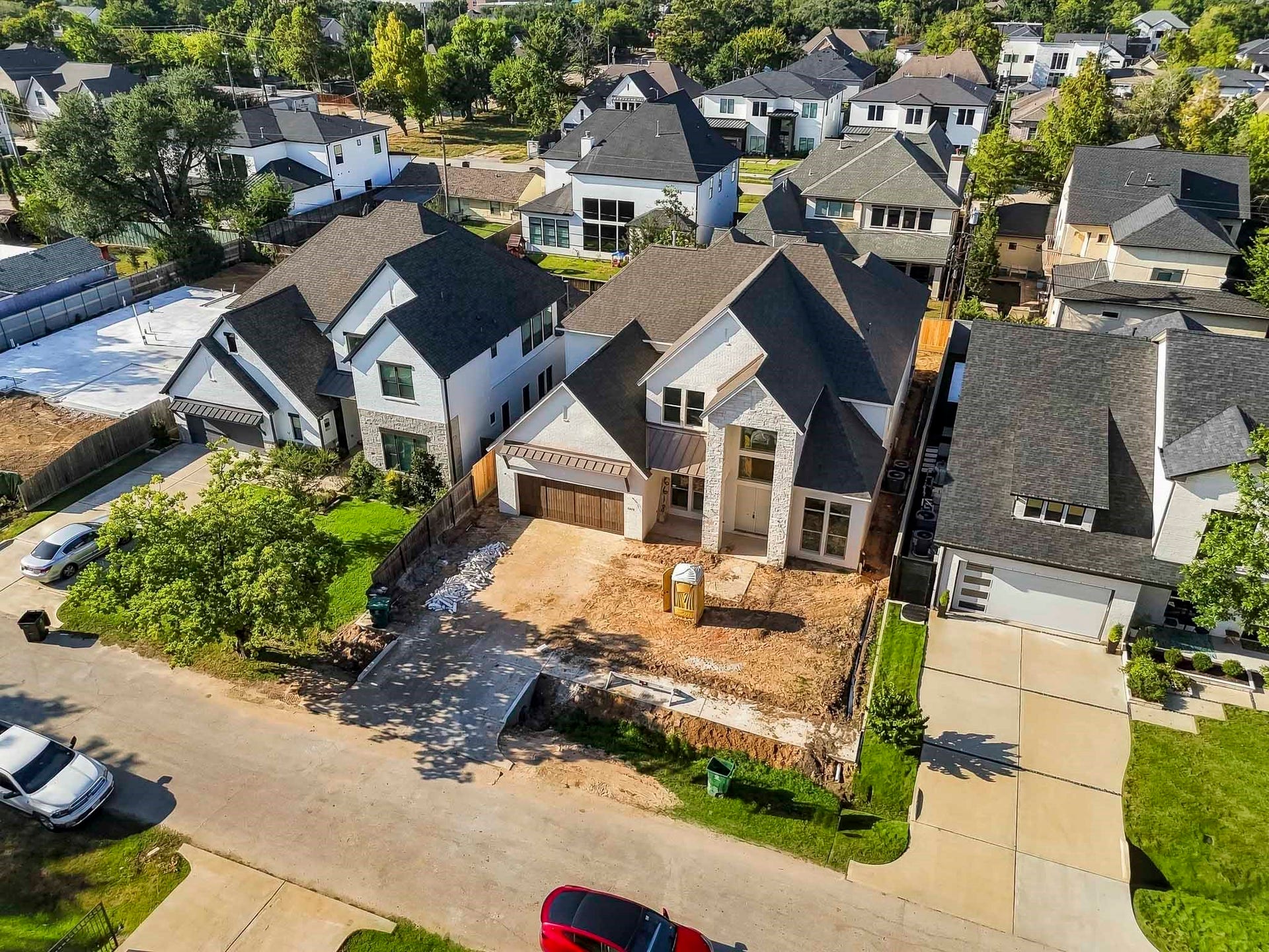 6618 Sivley Street, Hockley, TX 77055 Stunning modern home in a desirable neighborhood, featuring a spacious driveway and elegant architectural design with large windows and a two-car garage!