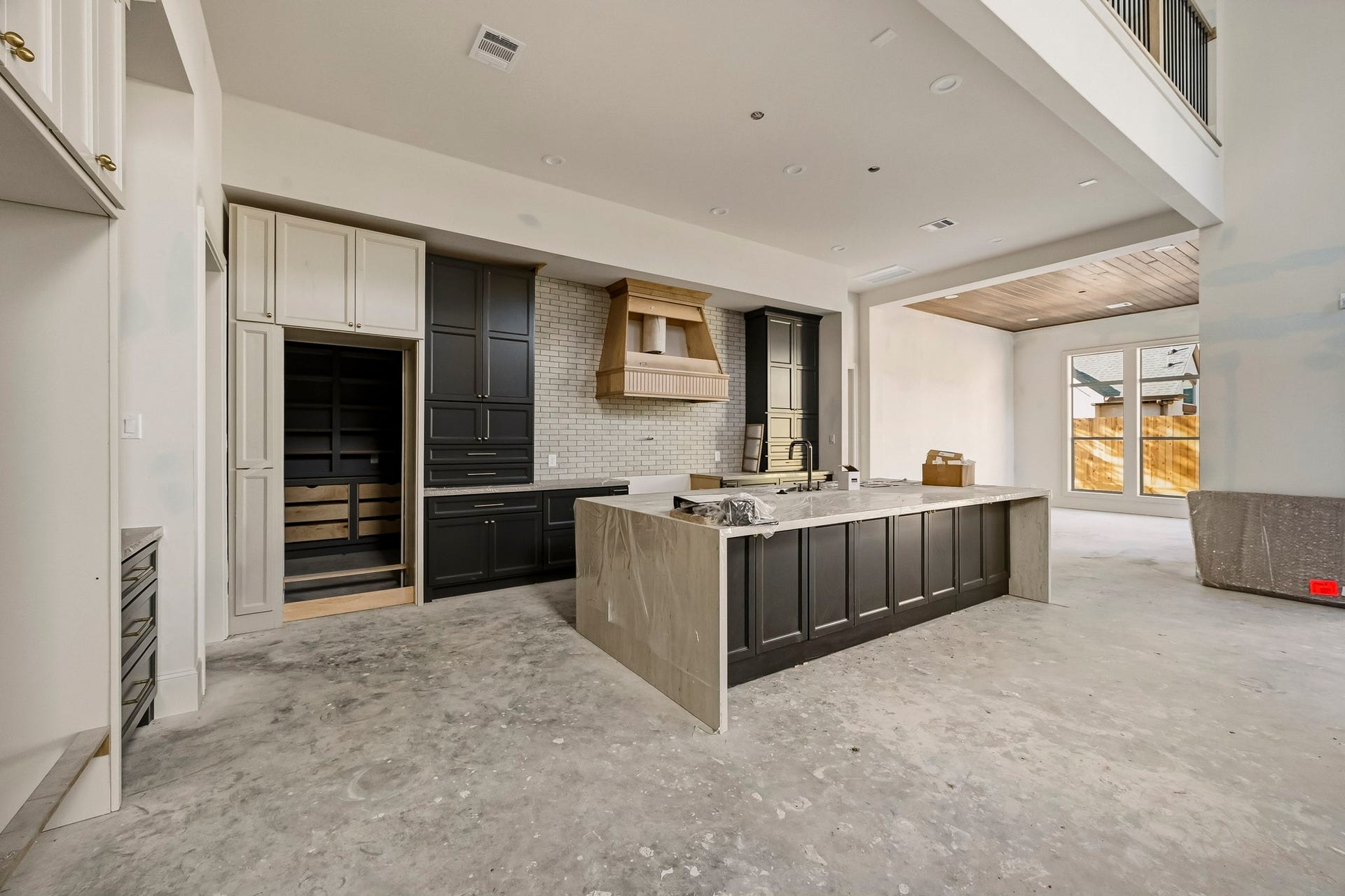 6618 Sivley Street, Hockley, TX 77055 Open concept kitchen with hidden scullery and oversized island!
