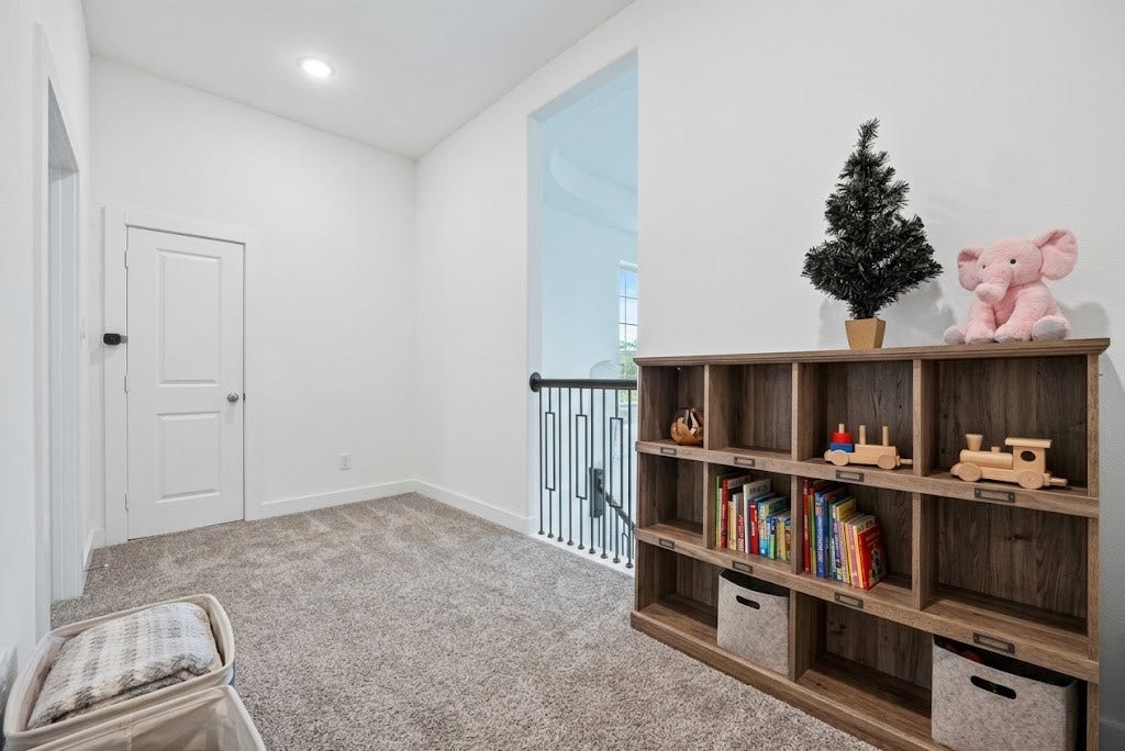 10114 Brush Way, Rosharon, TX 77583 Bright and inviting space perfect for a play area or reading nook, featuring plush carpeting.
