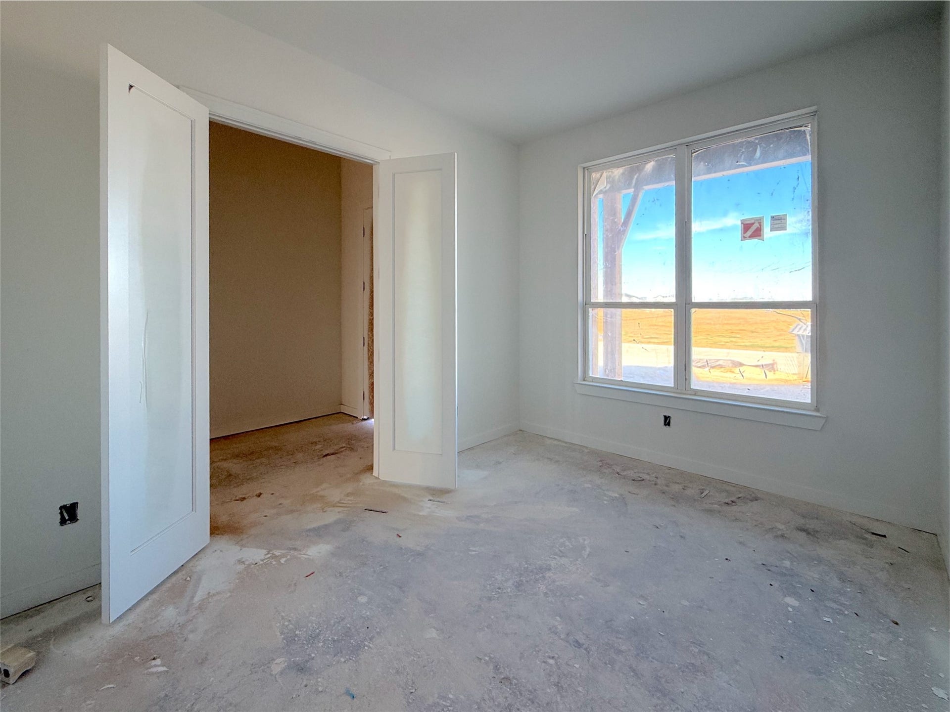 Private study in the front with a large window for natural light