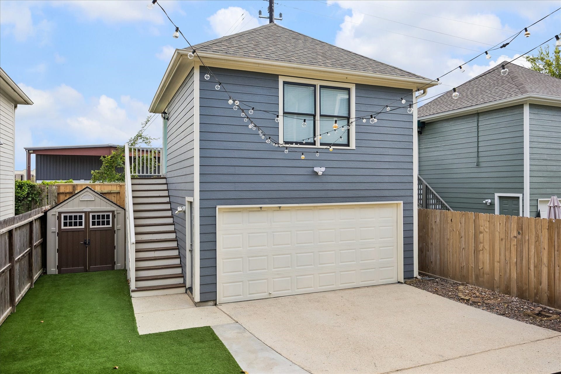 1332 W 21st Street, #B, Houston, TX 77008 The finished garage apartment offers versatile additional space with its own exterior staircase and separate entrance.