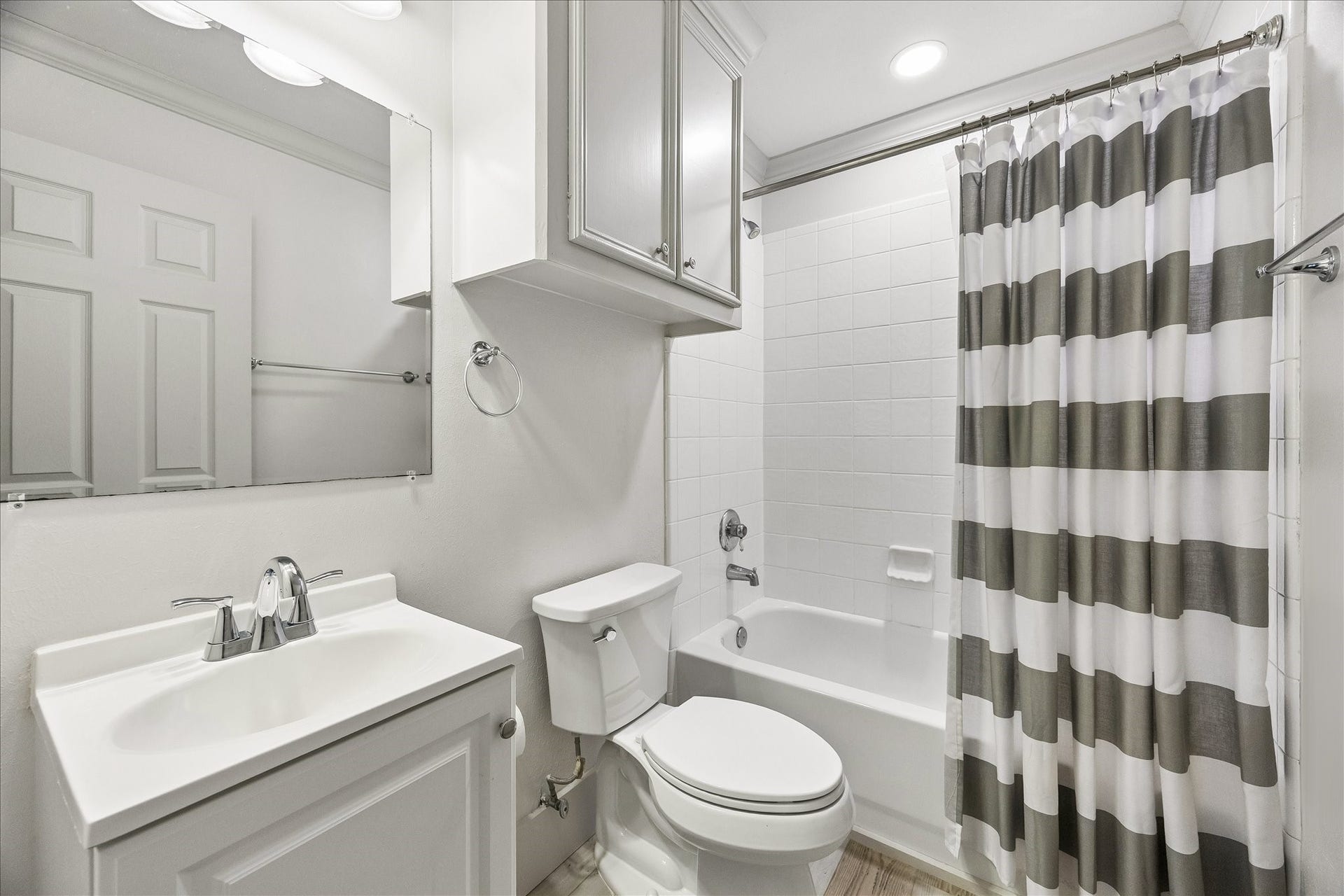 1332 W 21st Street, #B, Houston, TX 77008 A private full bathroom with a tub-shower combination completes this versatile garage apartment.