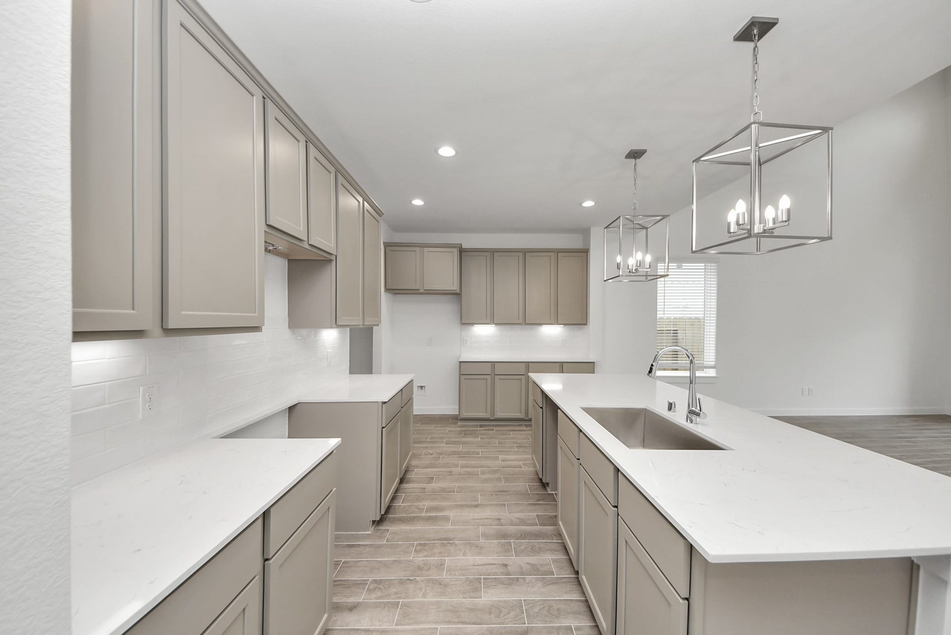 11119 Rose River Drive, Houston, TX 77044 All of this overlooks your expansive family room, creating a perfect space for culinary delights and family gatherings.