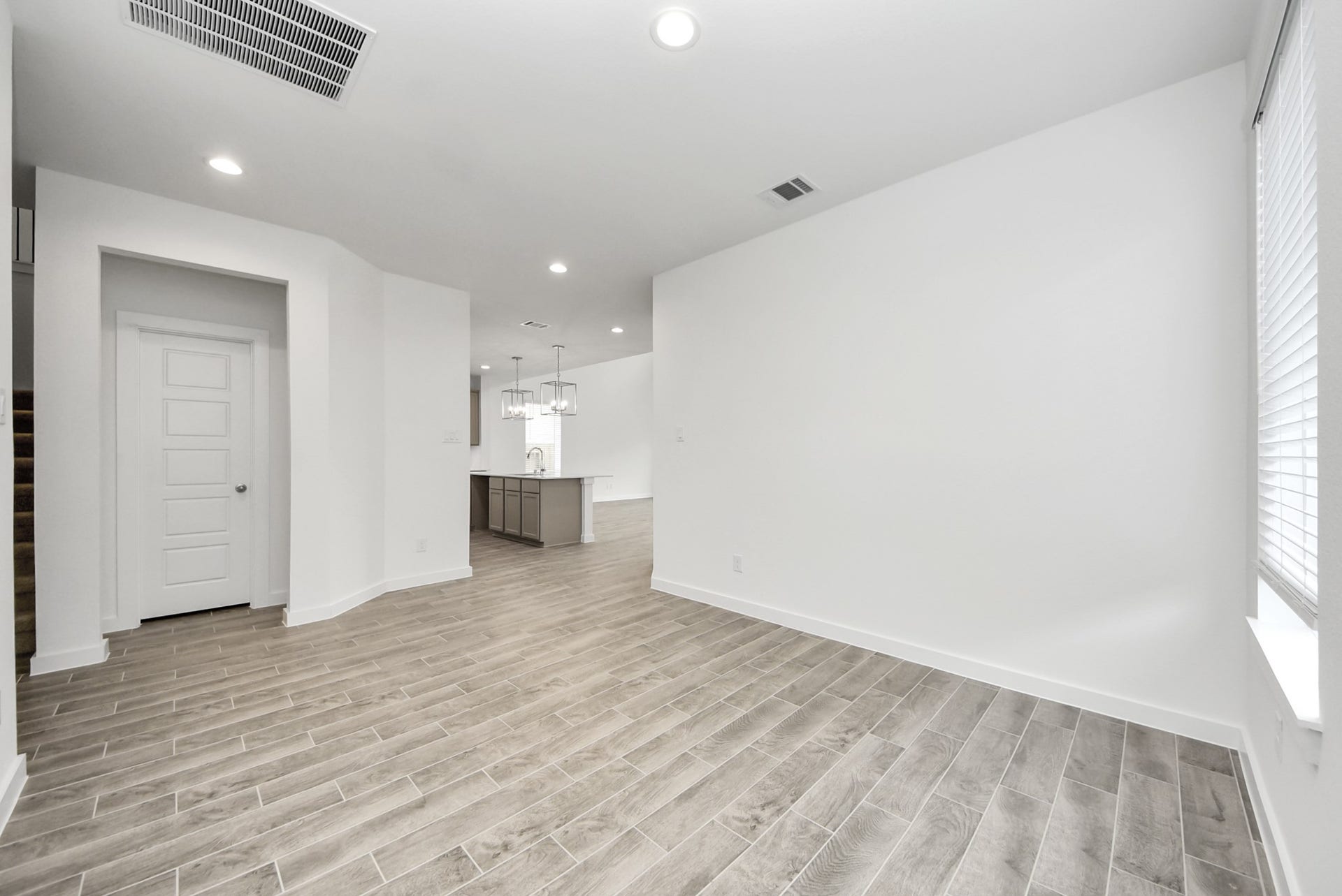 11119 Rose River Drive, Houston, TX 77044 Make memories gathered around the table with your family and friends! This spacious dining room features elegant flooring, custom paint, and adjacent to family room and kitchen for open concept feel.