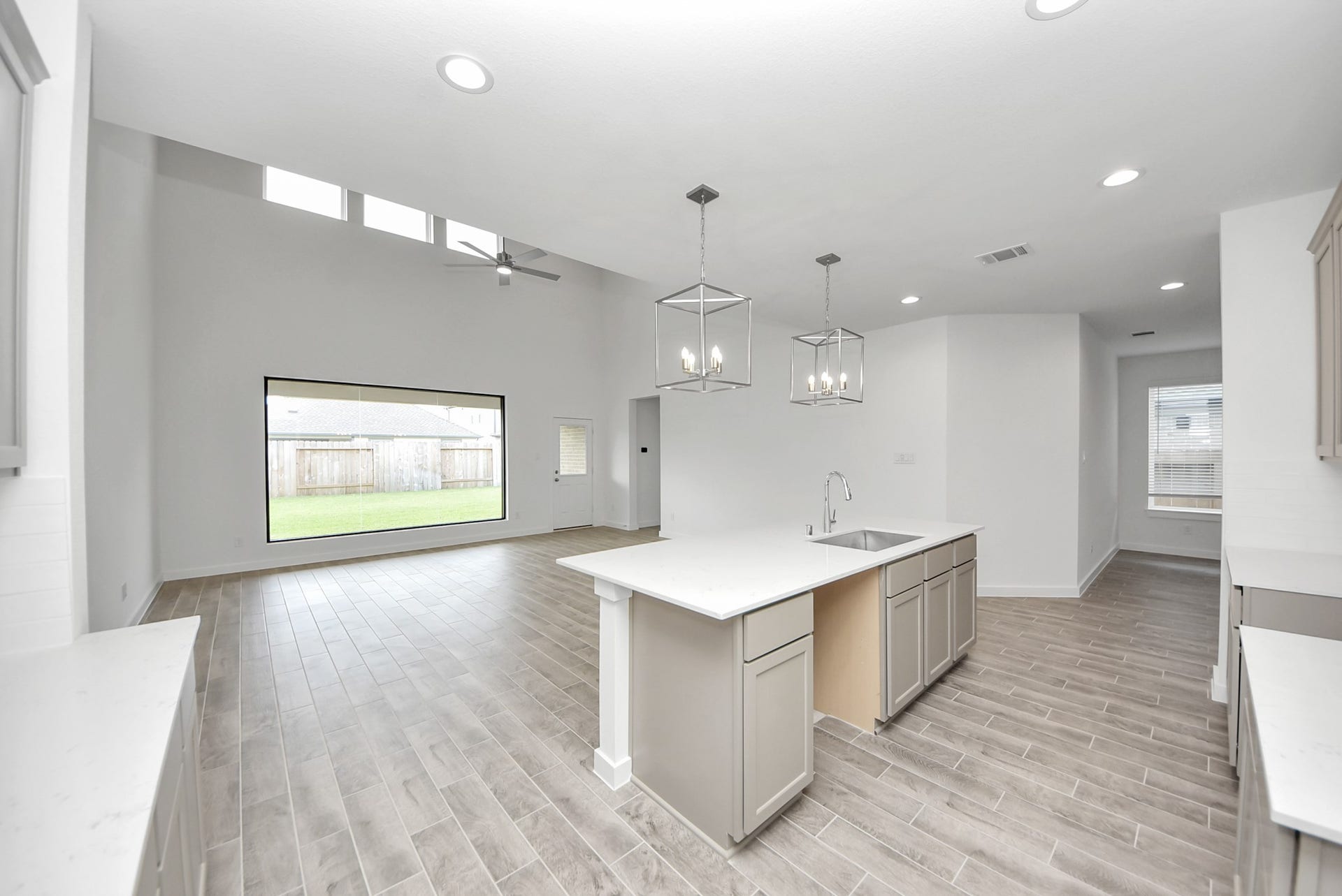 11119 Rose River Drive, Houston, TX 77044 The extended counter area adds both practicality and style, making meal preparation a breeze. Every detail is thoughtfully designed to enhance the kitchen's functionality and aesthetic appeal.