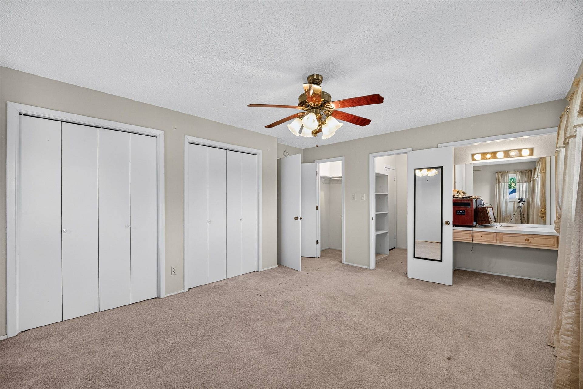 Another view of primary bedroom