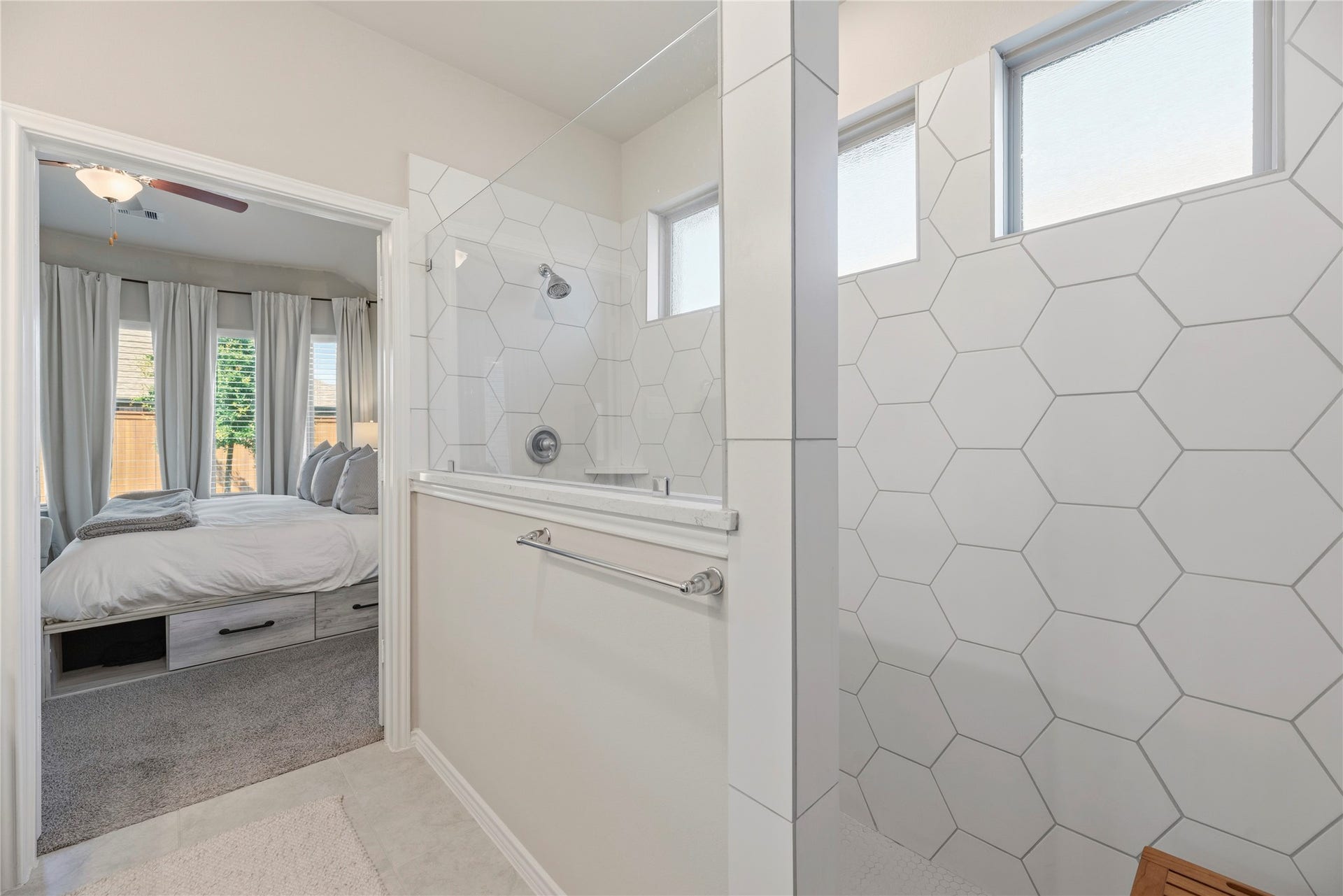 12914 Catfish River Court, Cypress, TX 77433 Glass enclosed spacious walk in shower makes for a spa-like feel in the primary bathroom.