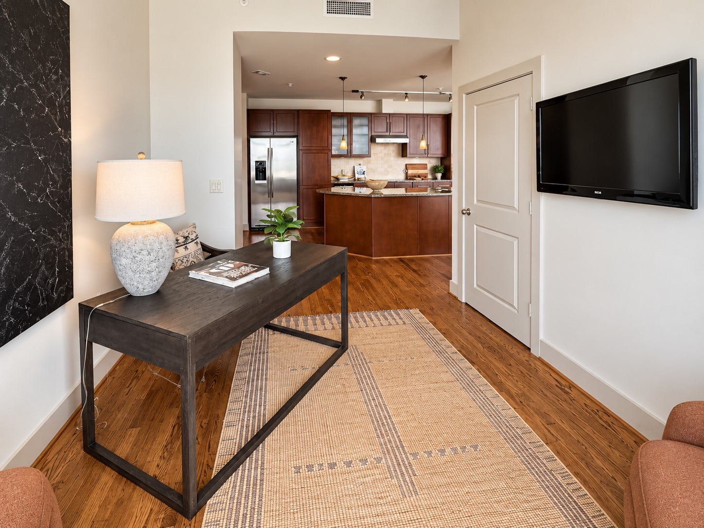 A thoughtful open layout allows each space to feel connected while still maintaining its own purpose. Whether working from home, entertaining friends, or simply enjoying a quiet afternoon, the residence is designed around an effortless lock-and-leave lifestyle.