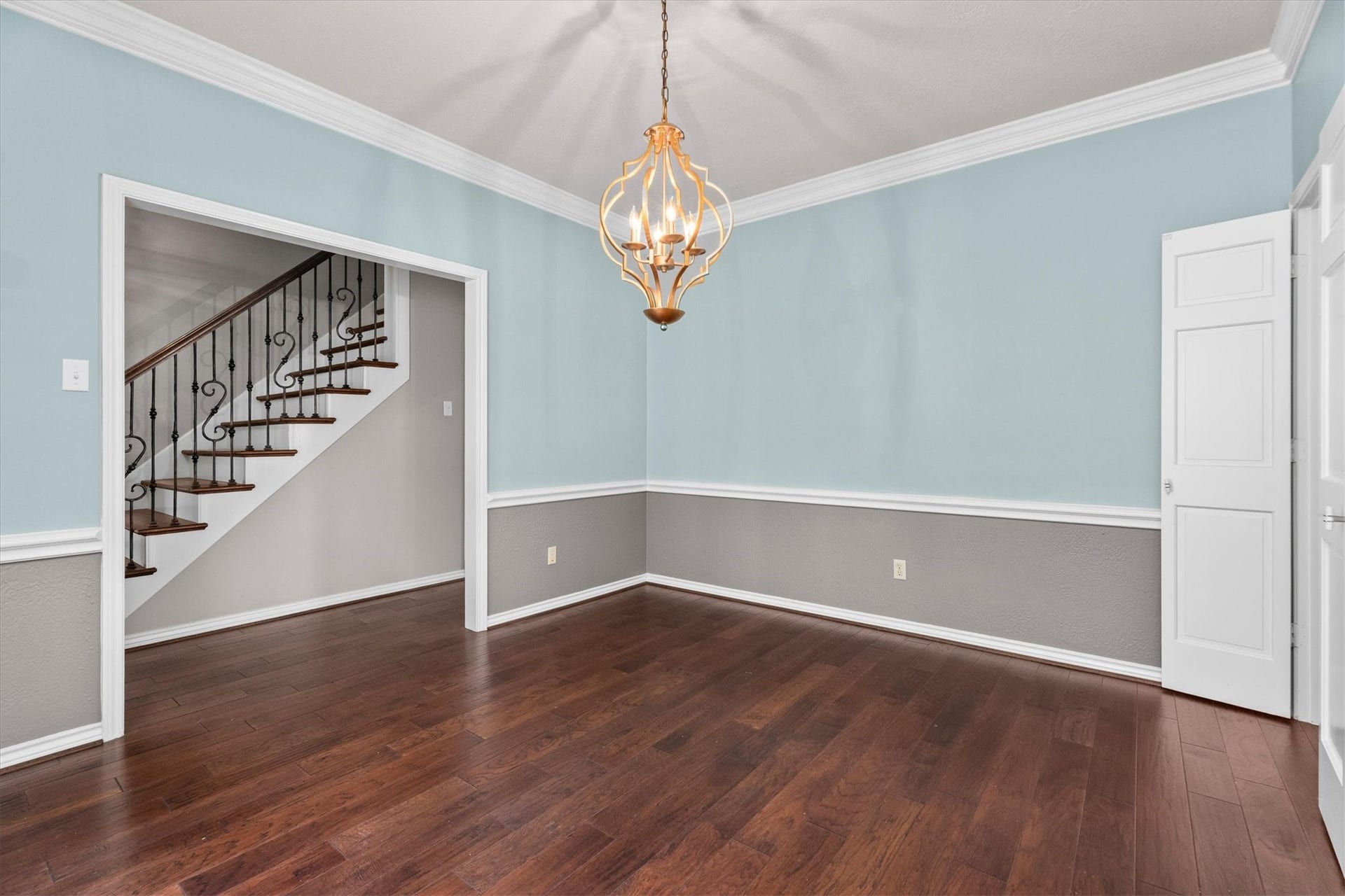 The formal dining room efficiently connects the entry to the kitchen and is the perfect space for gathering.