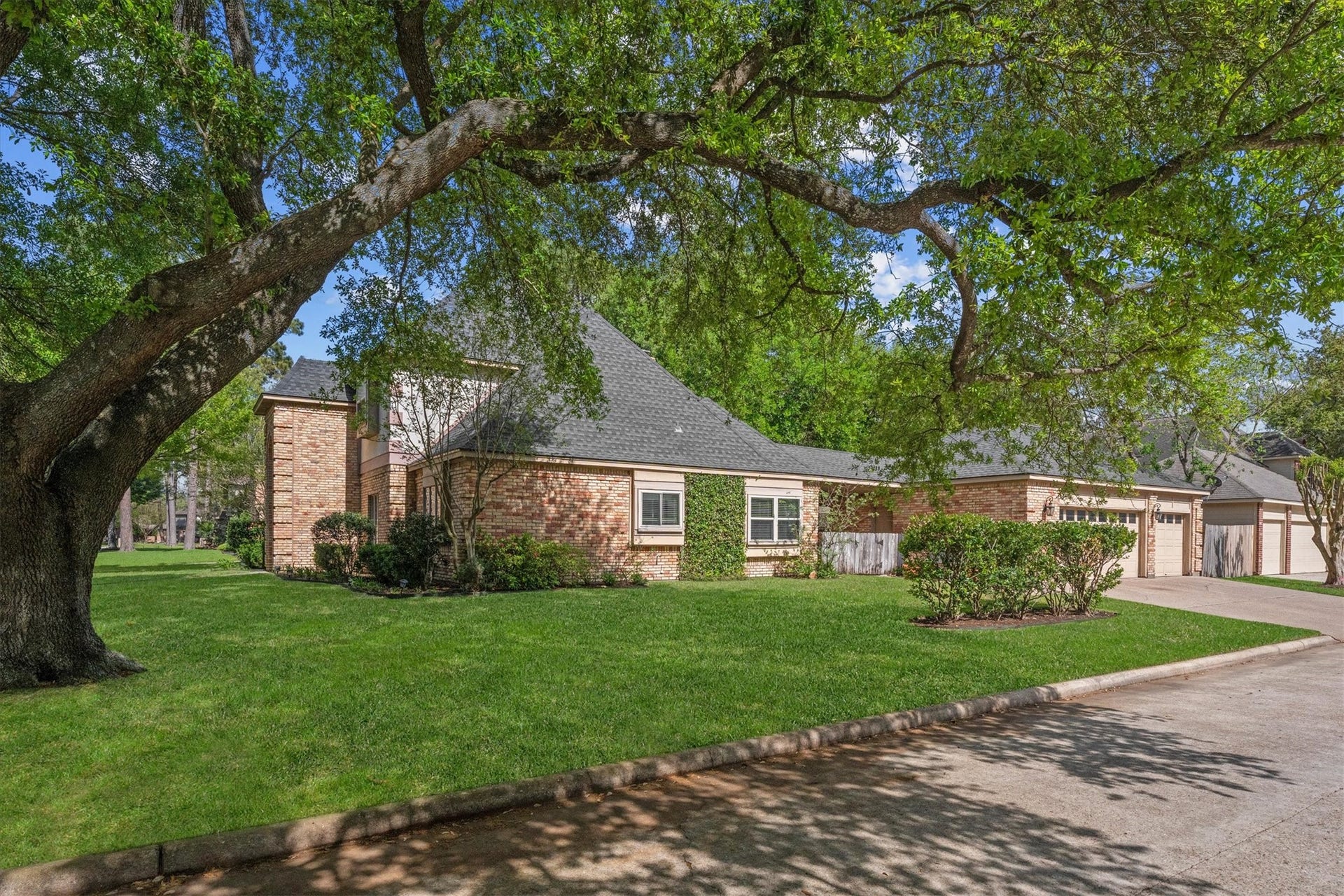 A side-entry three-car garage with a three-car wide driveway allows ample space for your vehicles and guests.