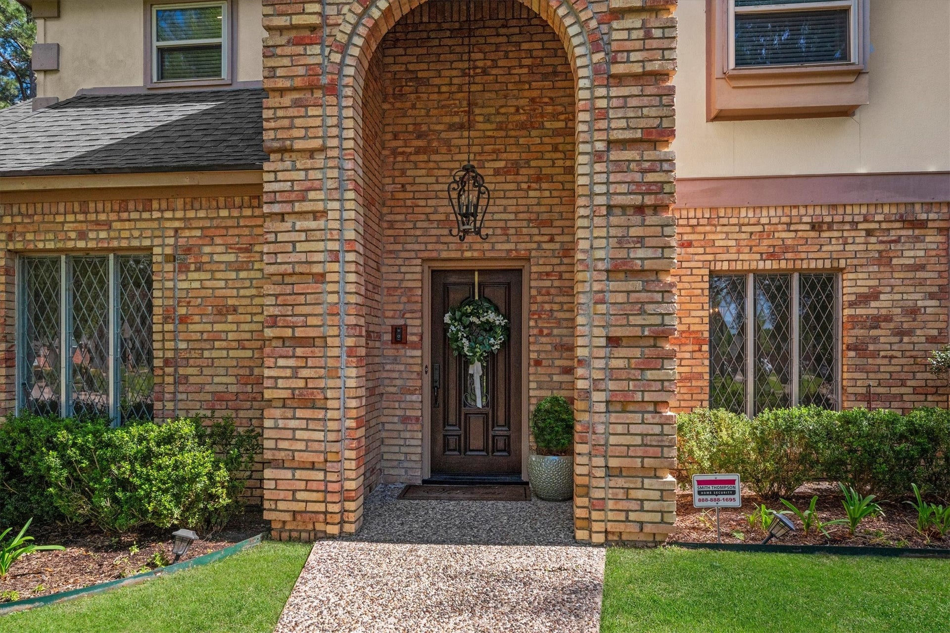 This home features classic Champion Forest style including leaded glass windows. (Other windows were replaced in 2014 per Seller)