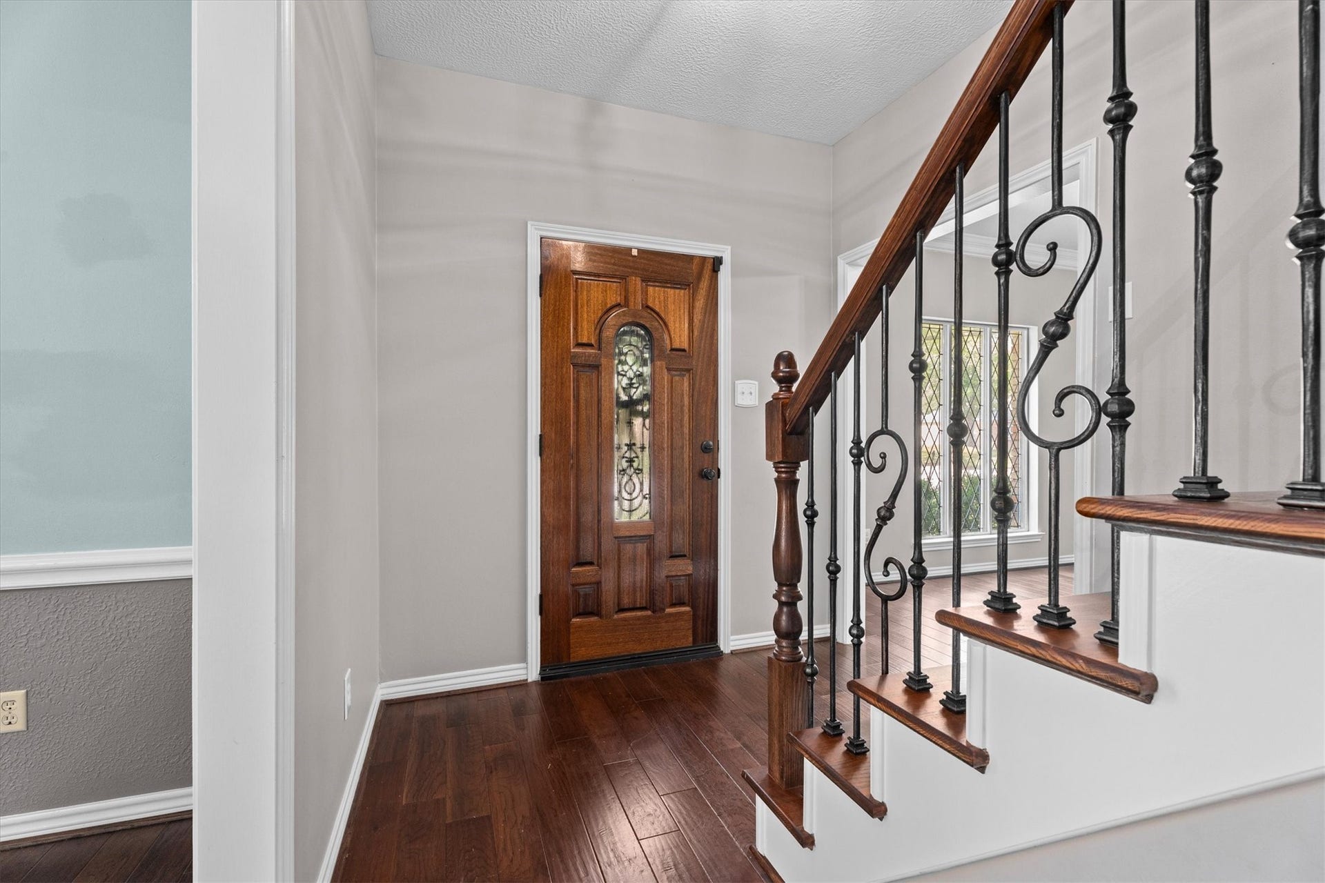 Welcome in! Warm, wood flooring throughout the first floor welcomes you in and flows nicely into the formal living, dining, and family rooms from the entry.