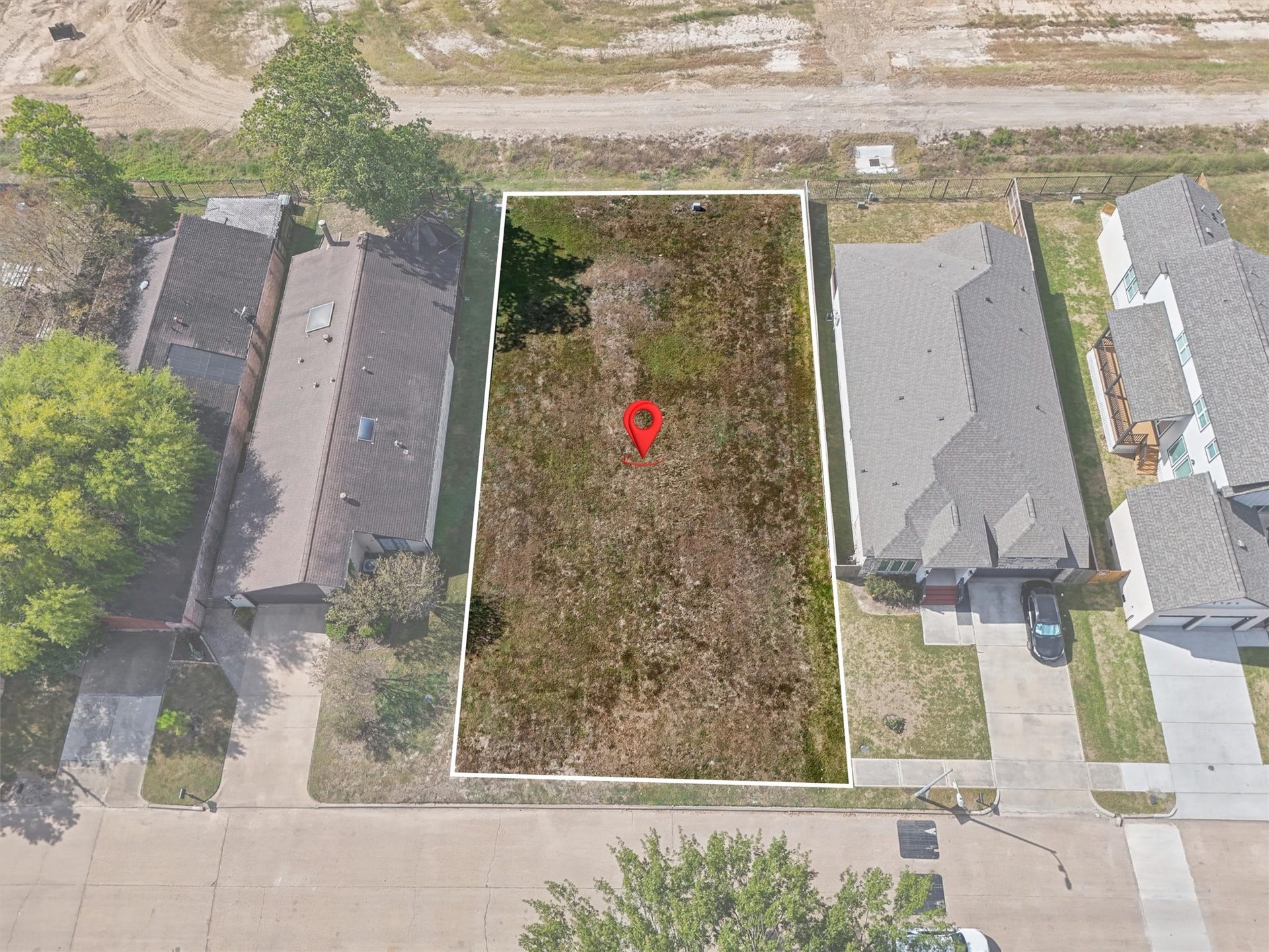 7713 Green Lawn Drive, Houston, TX 77088 BUILD YOUR DREAM HOME! Imagine the possibilities on this residential lot nestled between established homes! The white outline highlights the property's boundaries, while the red location pin marks the perfect spot to bring your vision to life. Whether you're dreaming of a modern custom home, a spacious family retreat, or your forever home, this vacant lot offers a blank canvas to create something truly special.