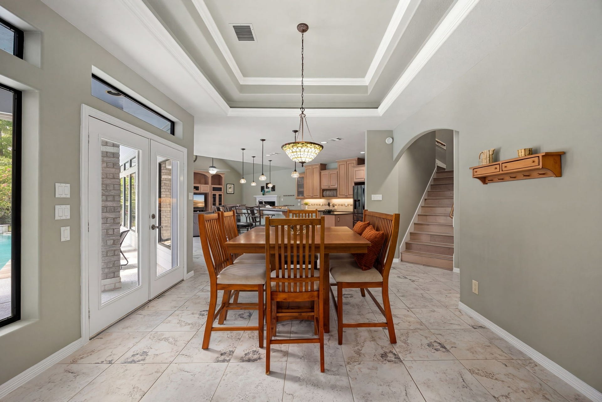 11956 White Oak Crossing, Conroe, TX 77385 Dining area off kitchen, shows stairs to game room