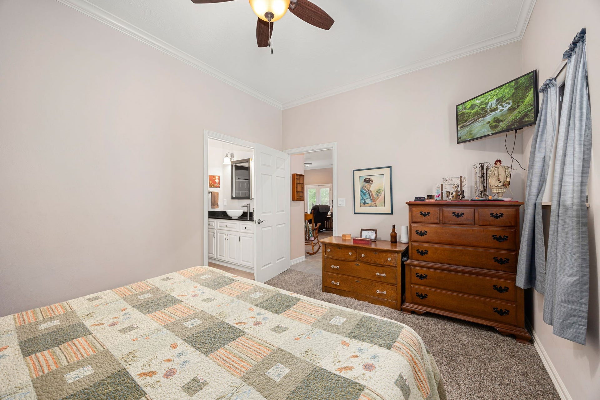 11956 White Oak Crossing, Conroe, TX 77385 Guest house bedroom 1 showing bathroom vanity.