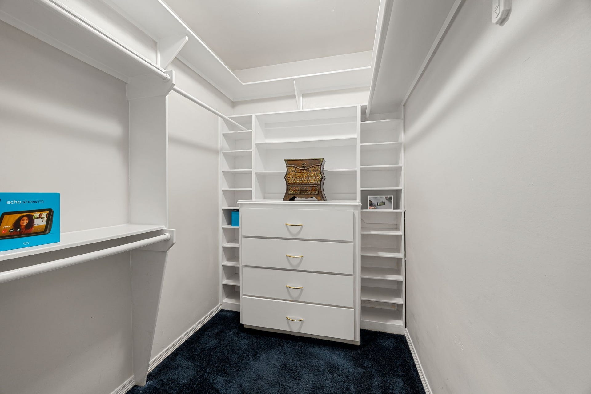 11956 White Oak Crossing, Conroe, TX 77385 Boutique-style primary suite walk-in closet, one of two located within the primary en-suite.