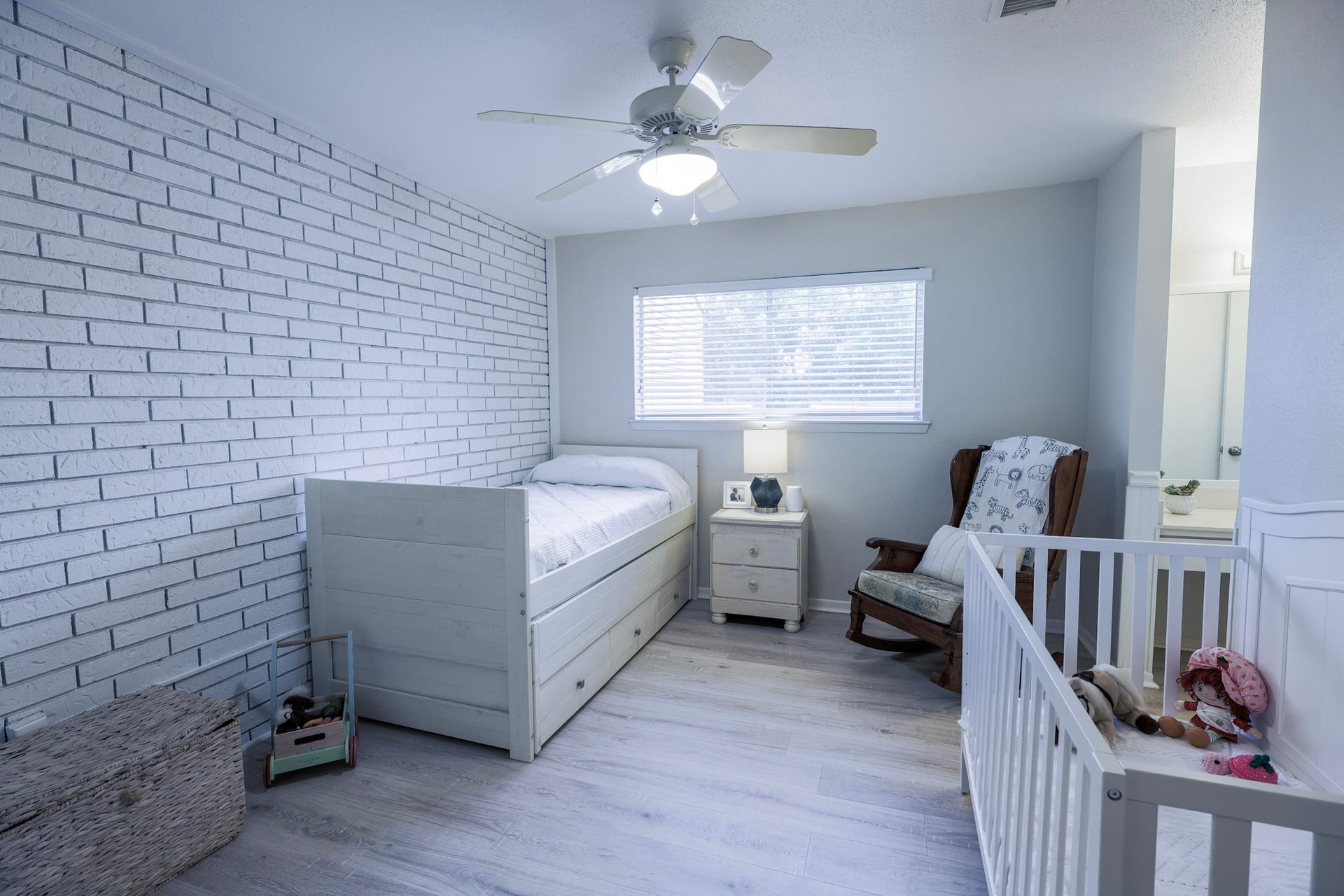 guest bedroom with lovely exposed brick wall