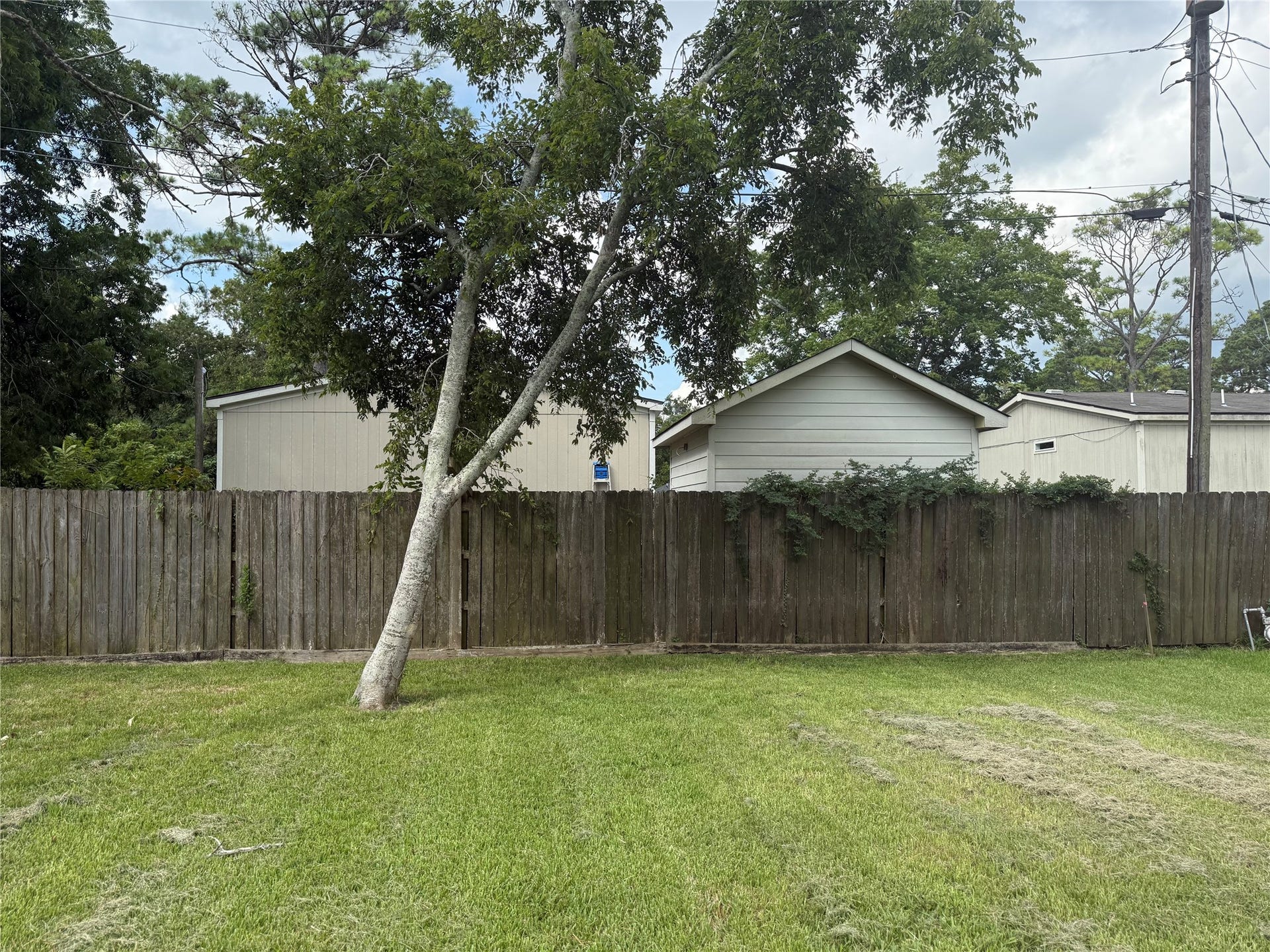 0000 Ave G, Dickinson, TX 77539 View of back of the land with back fence.