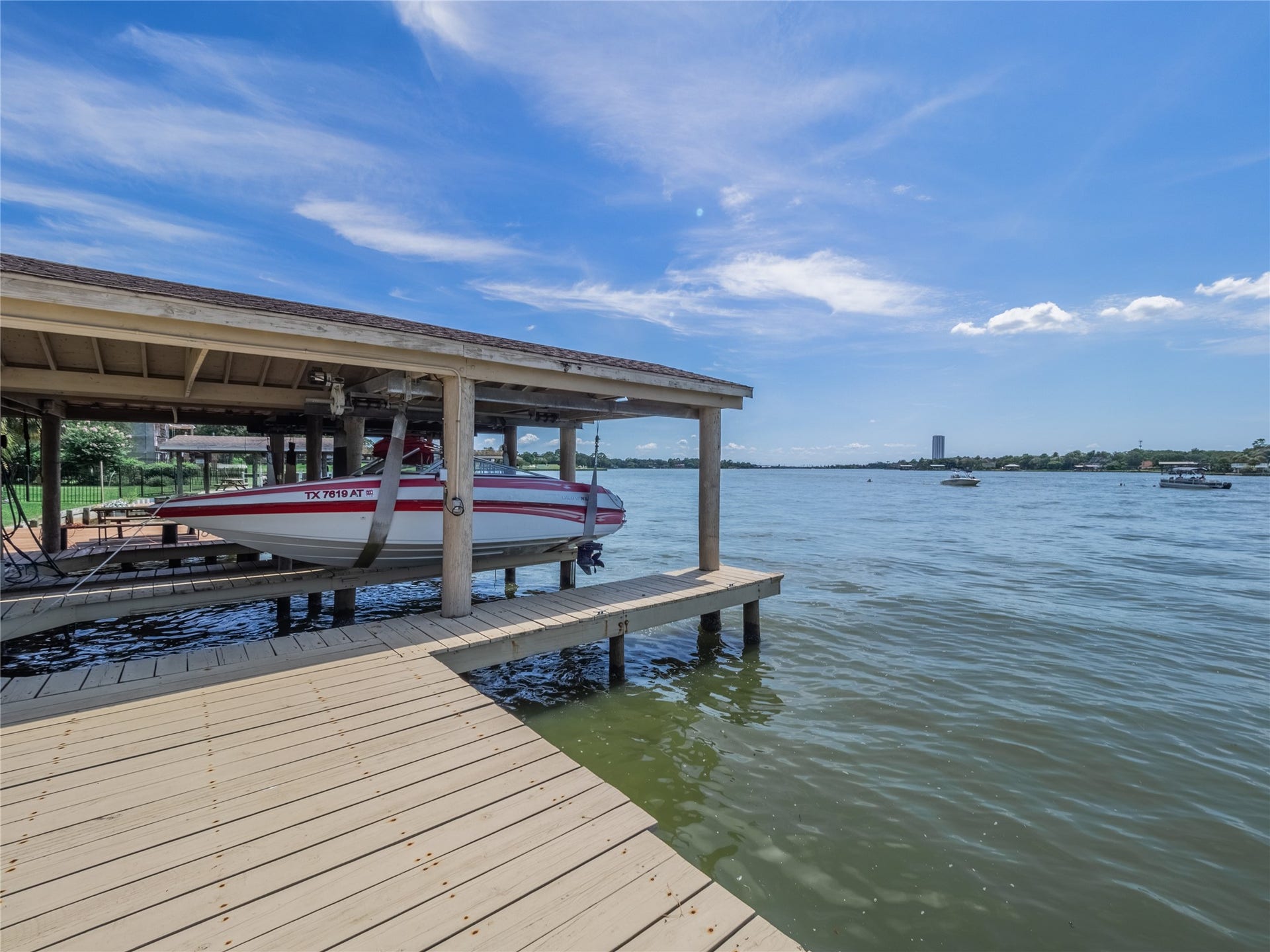 1623 Lake Arbor Drive, El Lago, TX 77586 COVERED BOATHOUSE COMPLETE WITH DOCK AND LIFT.