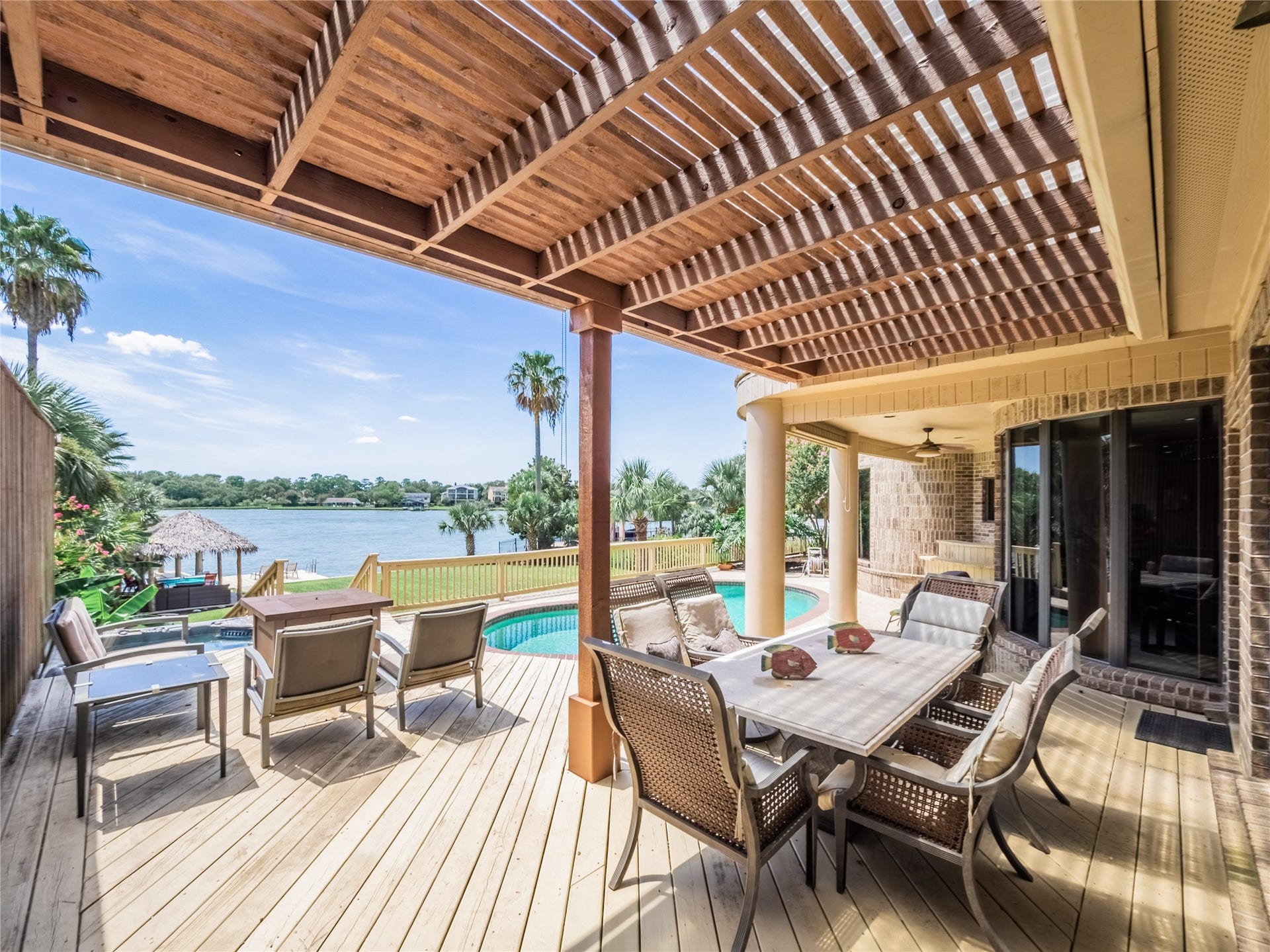 1623 Lake Arbor Drive, El Lago, TX 77586 DOORS FROM THE DEN OPEN TO THE COVERED PATIO.