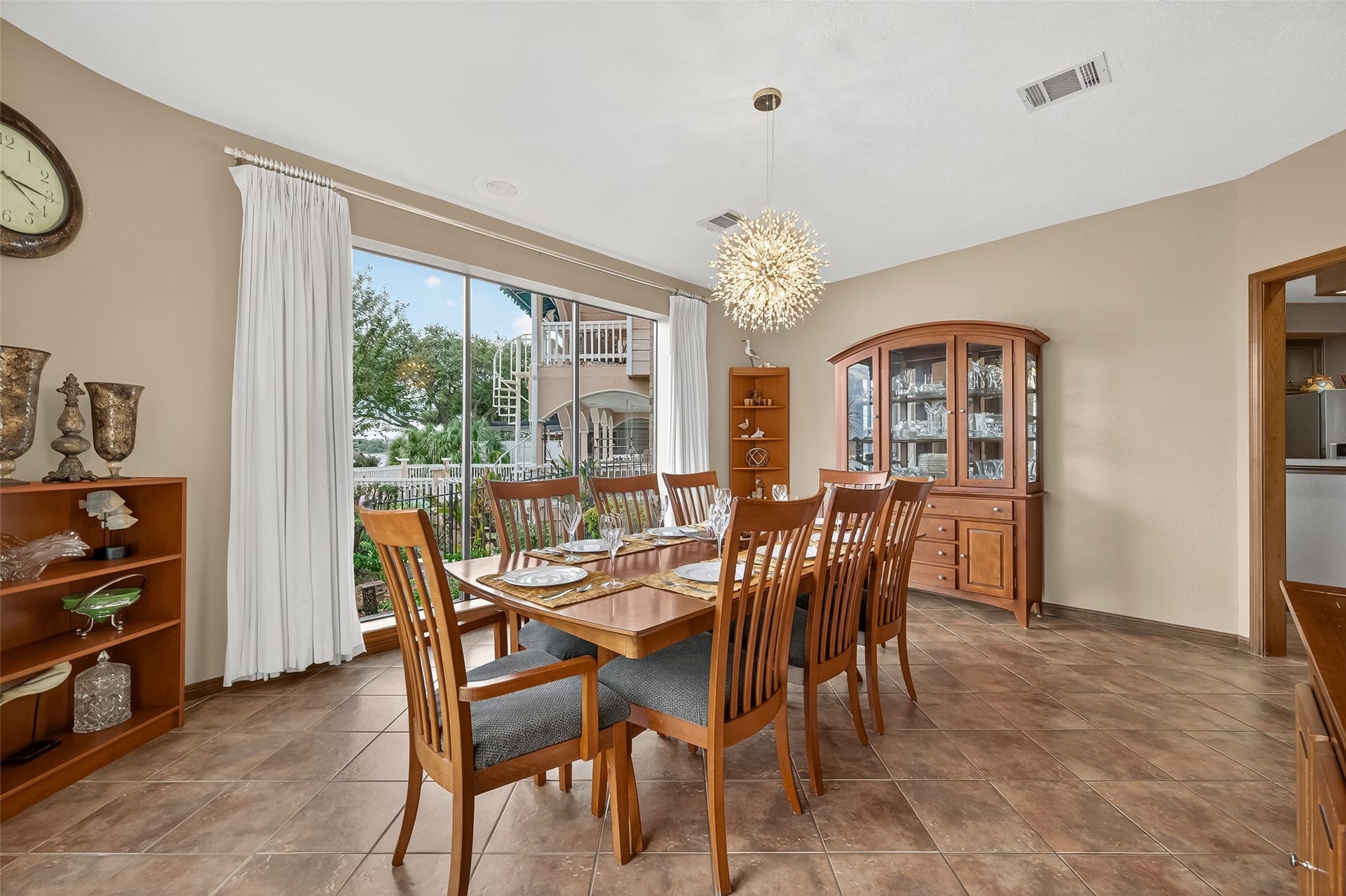 1623 Lake Arbor Drive, El Lago, TX 77586 SPACIOUS DINING ROOM WITH FLOOR TO CEILING WINDOWS OVERLOOKING THE LAKE.