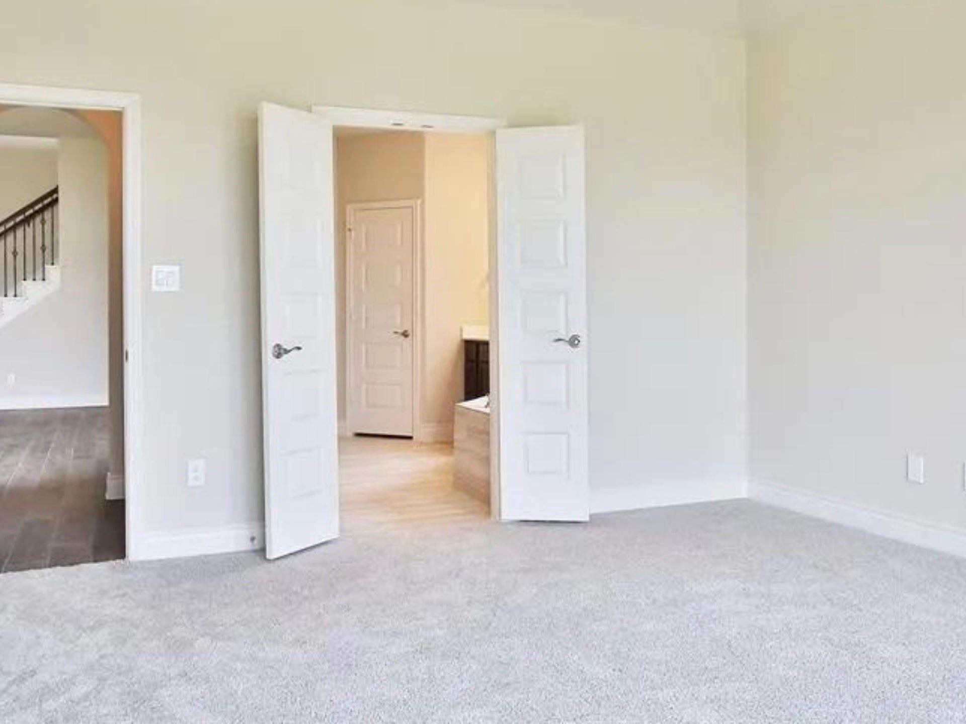 Beautiful primary bedroom downstairs.