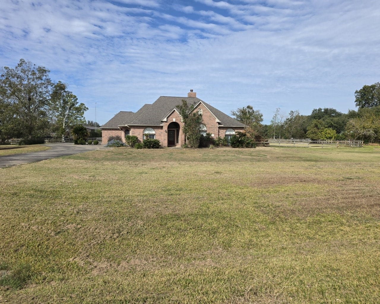 Home sits back from the street for privacy. Please come see for yourself!